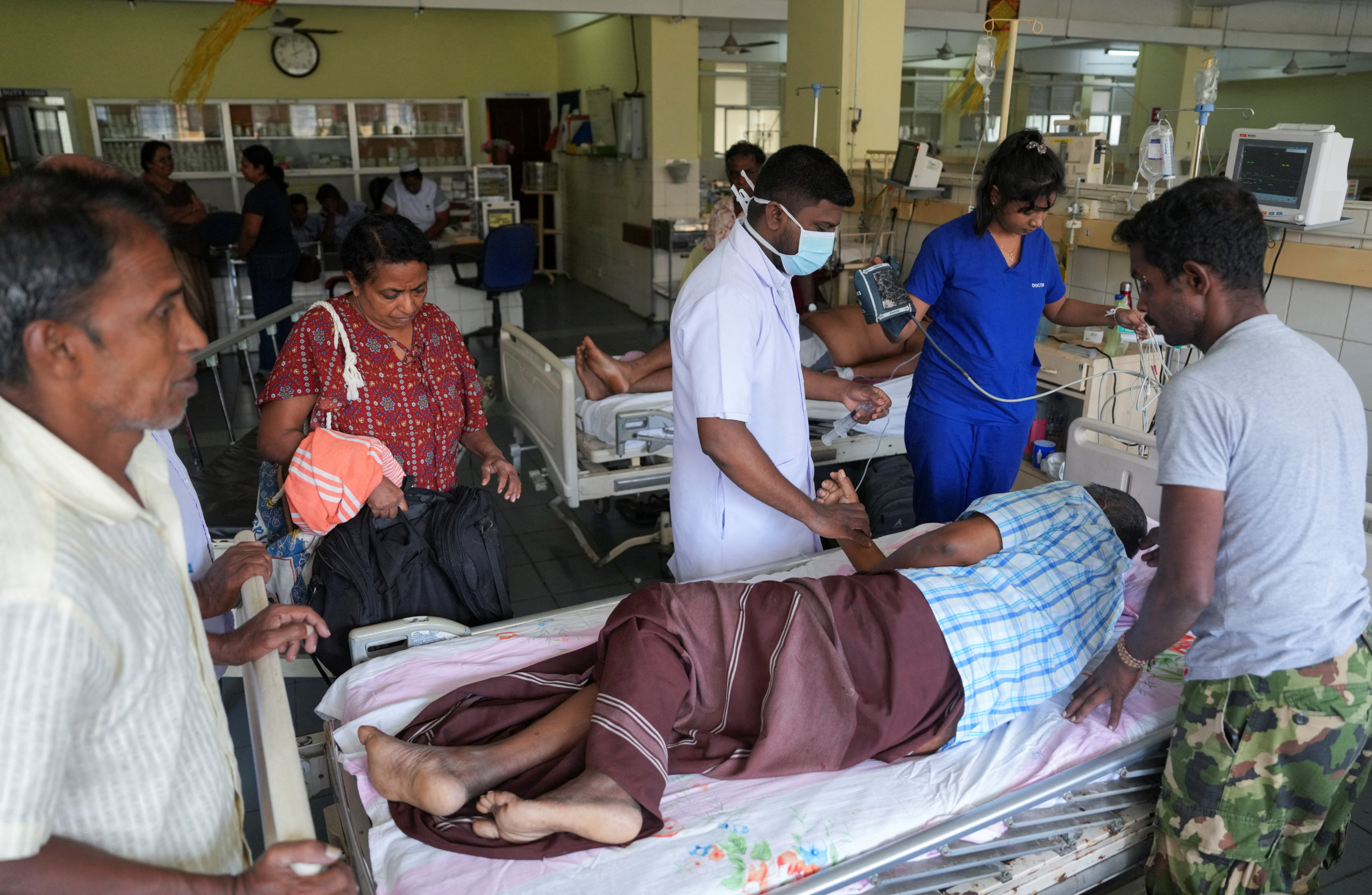 A dengue patient gets treatment at a hospital in Negombo, Sri Lanka