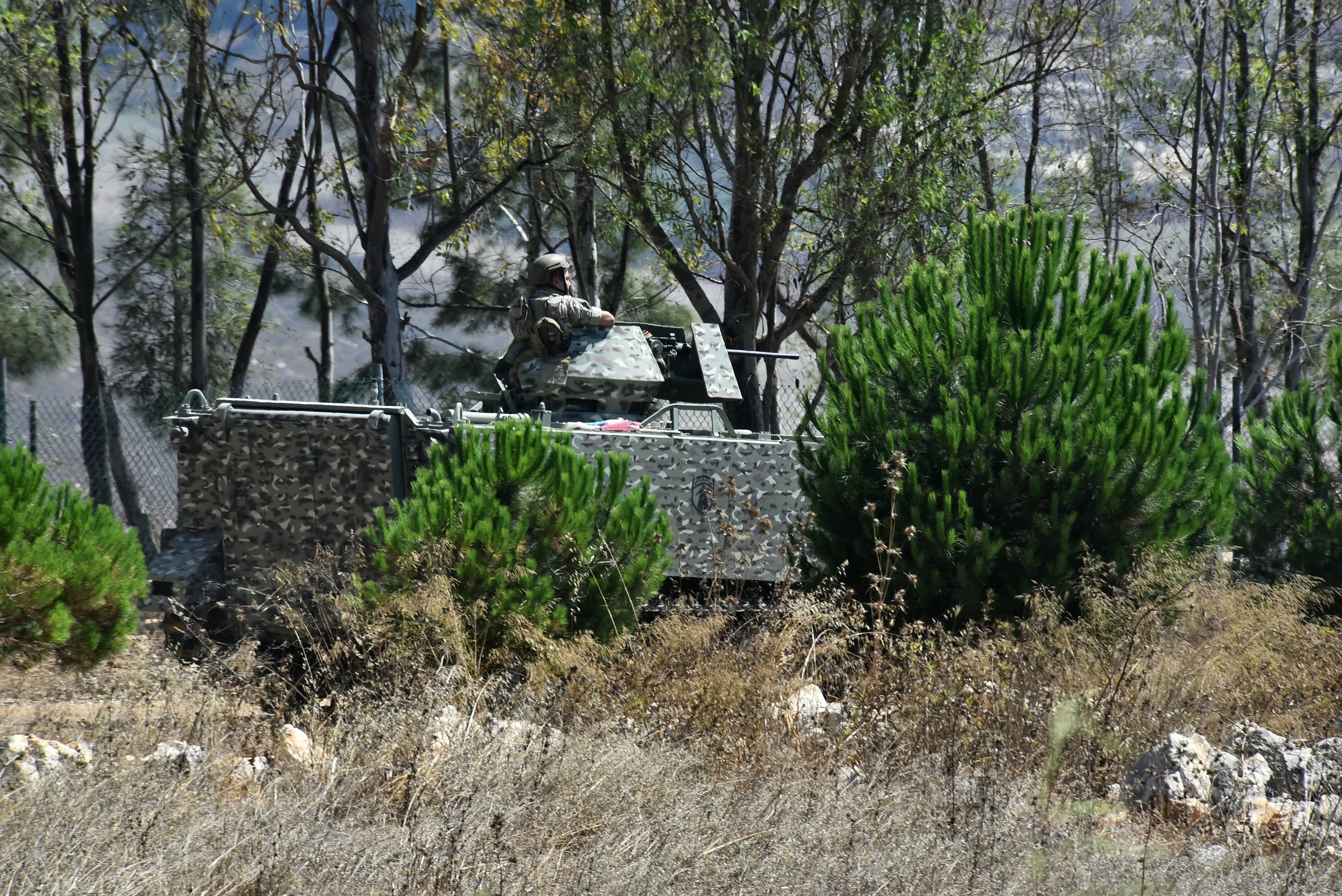 A Lebanese army armored vehicle enters the southern Lebanese village of Zawtar on July 21, 2026. The Lebanese army announced on July 21 that it had begun deploying to an area in the south, one of three 