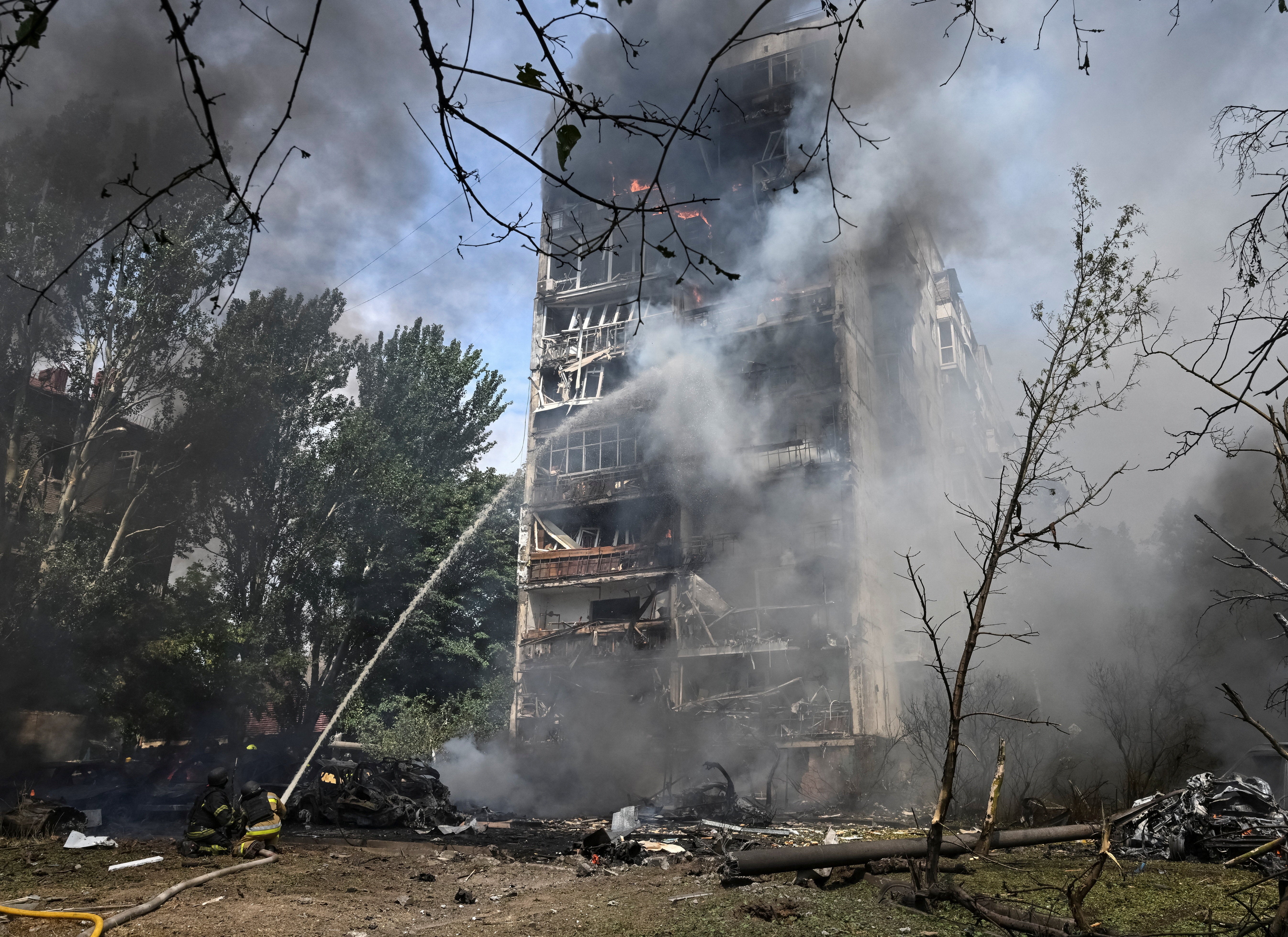 A Russian guided bomb hit an apartment building in the city (Reuters)
