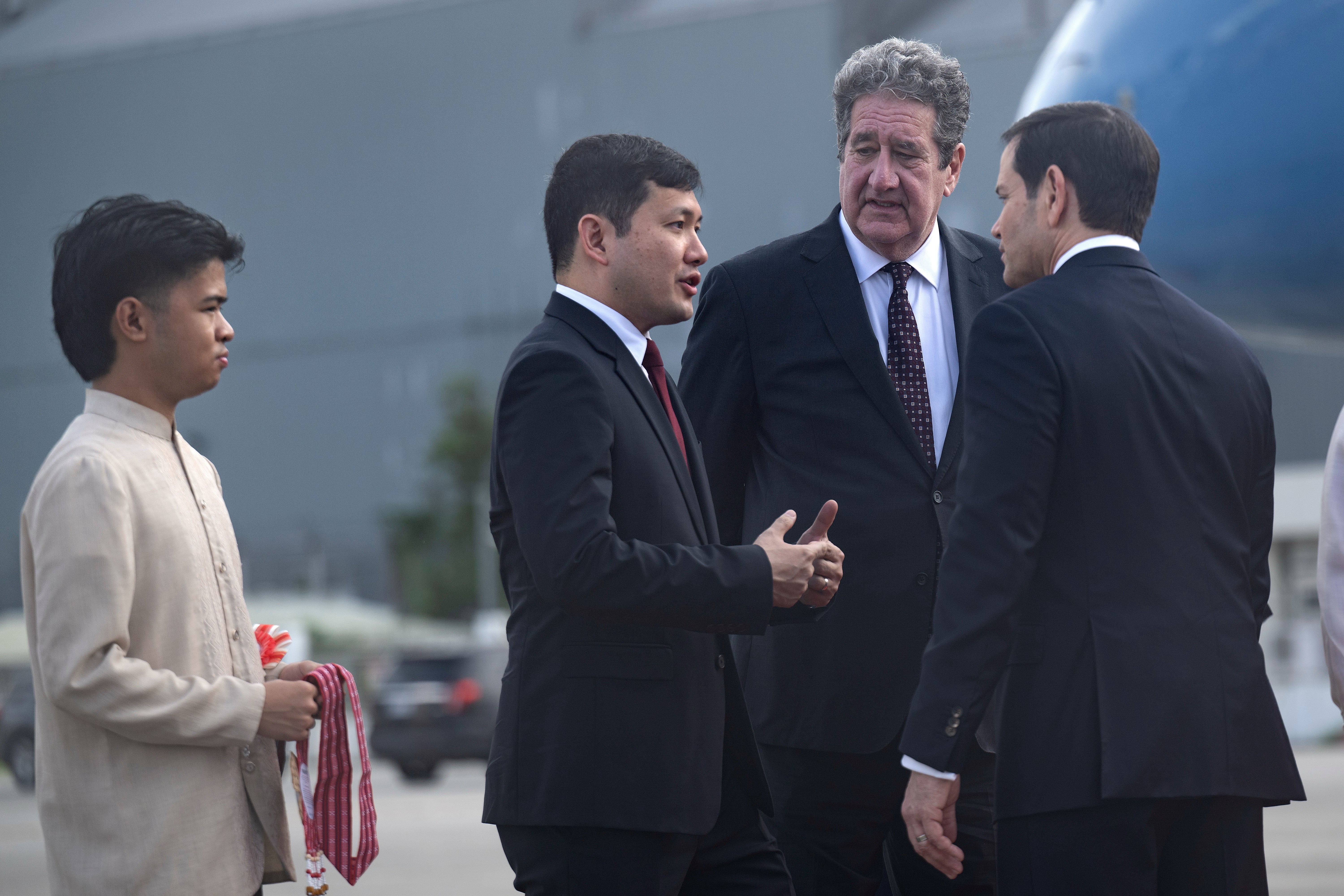 U.S. Ambassador to the Philippines Lee Lipton, second right, listens to U.S. Ambassador to ASEAN Kevin Kim, second left, speaking with Rubio