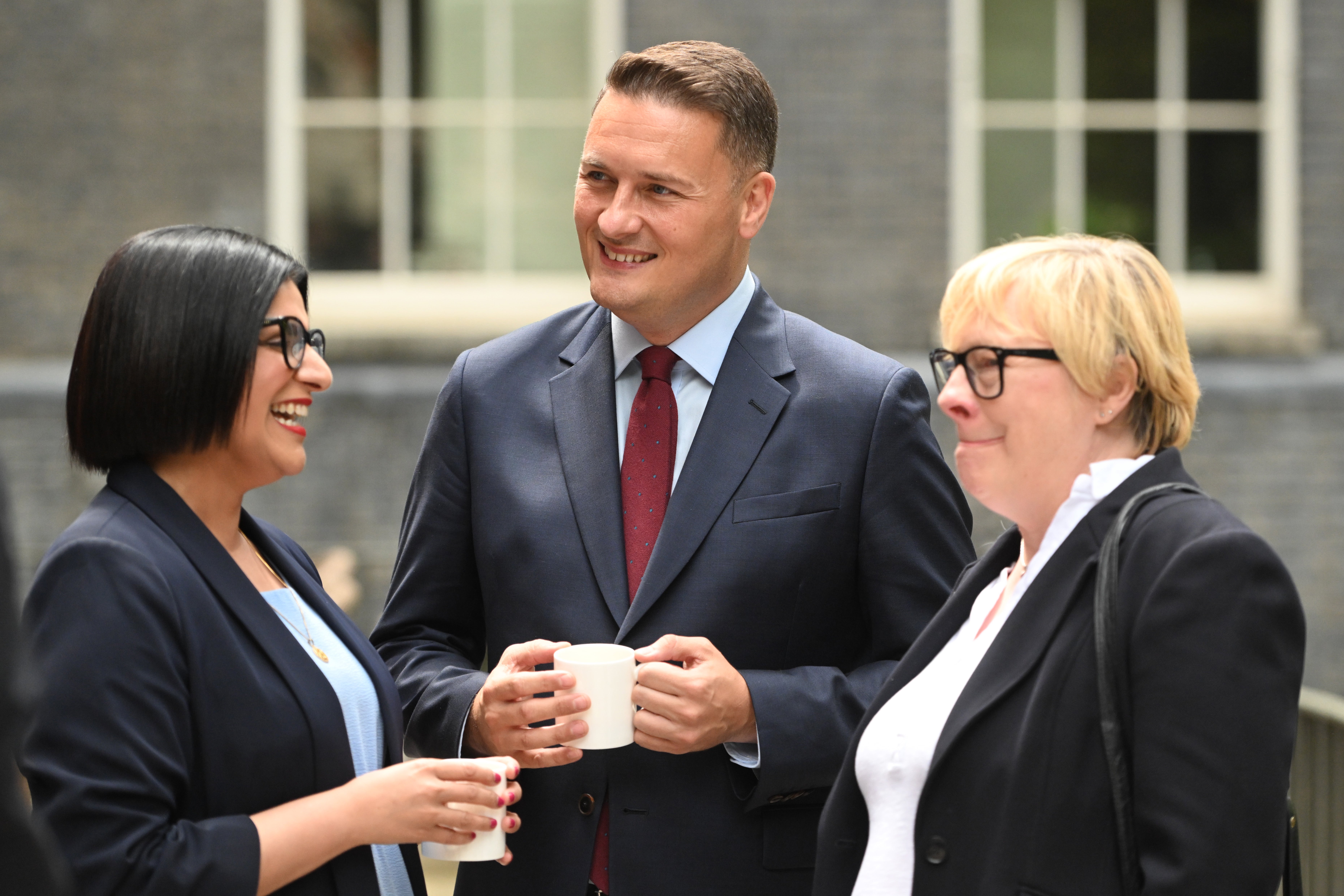 Home Secretary Shabana Mahmood, Defence Secretary Wes Streeting and Environment Secretary Angela Eagle speak at Downing Street (Getty)