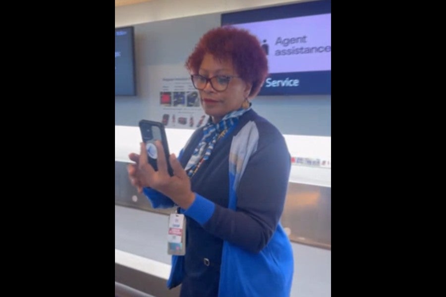 An unidentified United Airlines employee was captured on video appearing to threaten to call U.S. Immigration and Customs Enforcement on a passenger during a dispute at San Francisco International Airport (Julio Varela via Storyful)