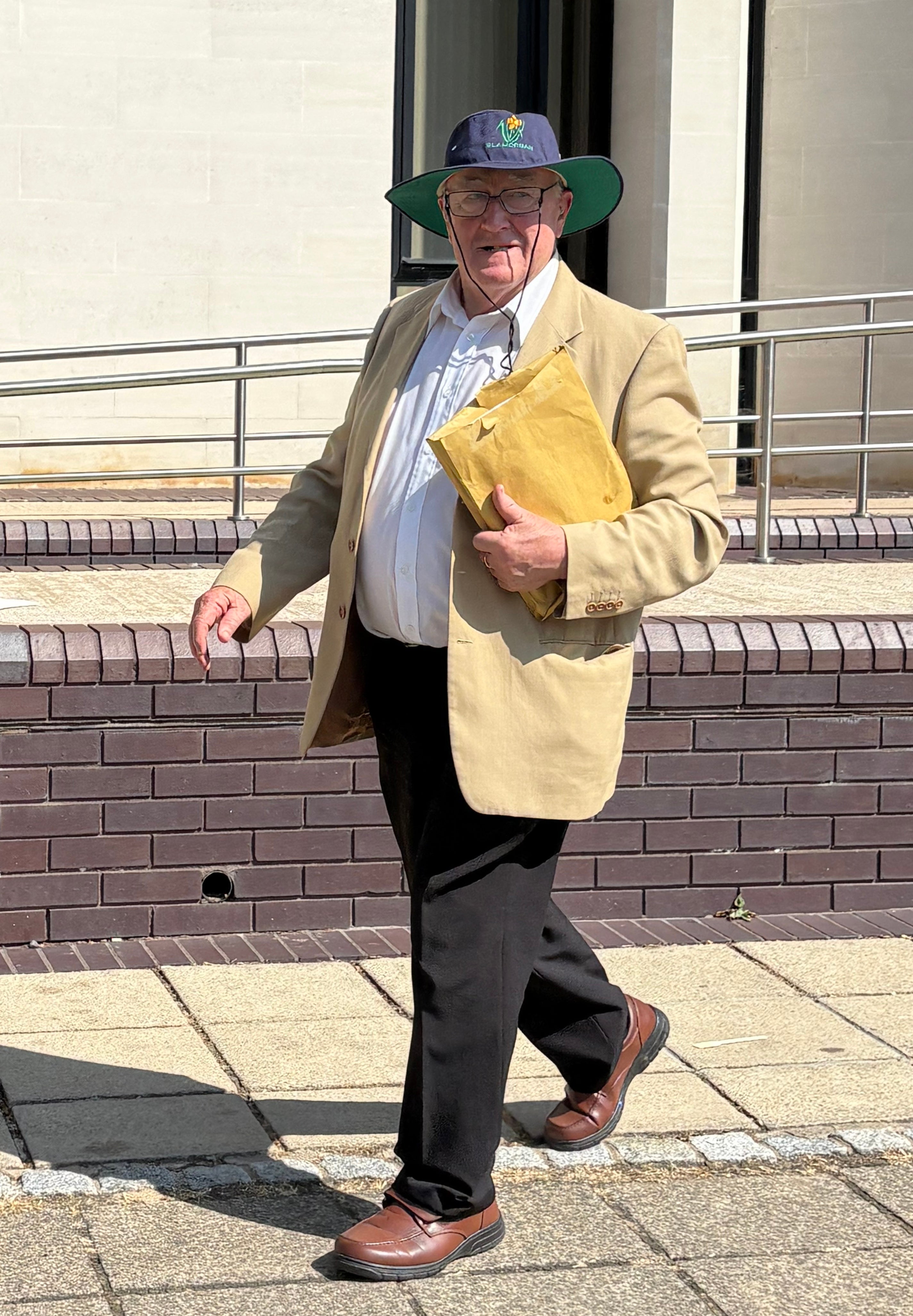 Former Labour MP Gwynoro Jones leaves Swansea Crown Court