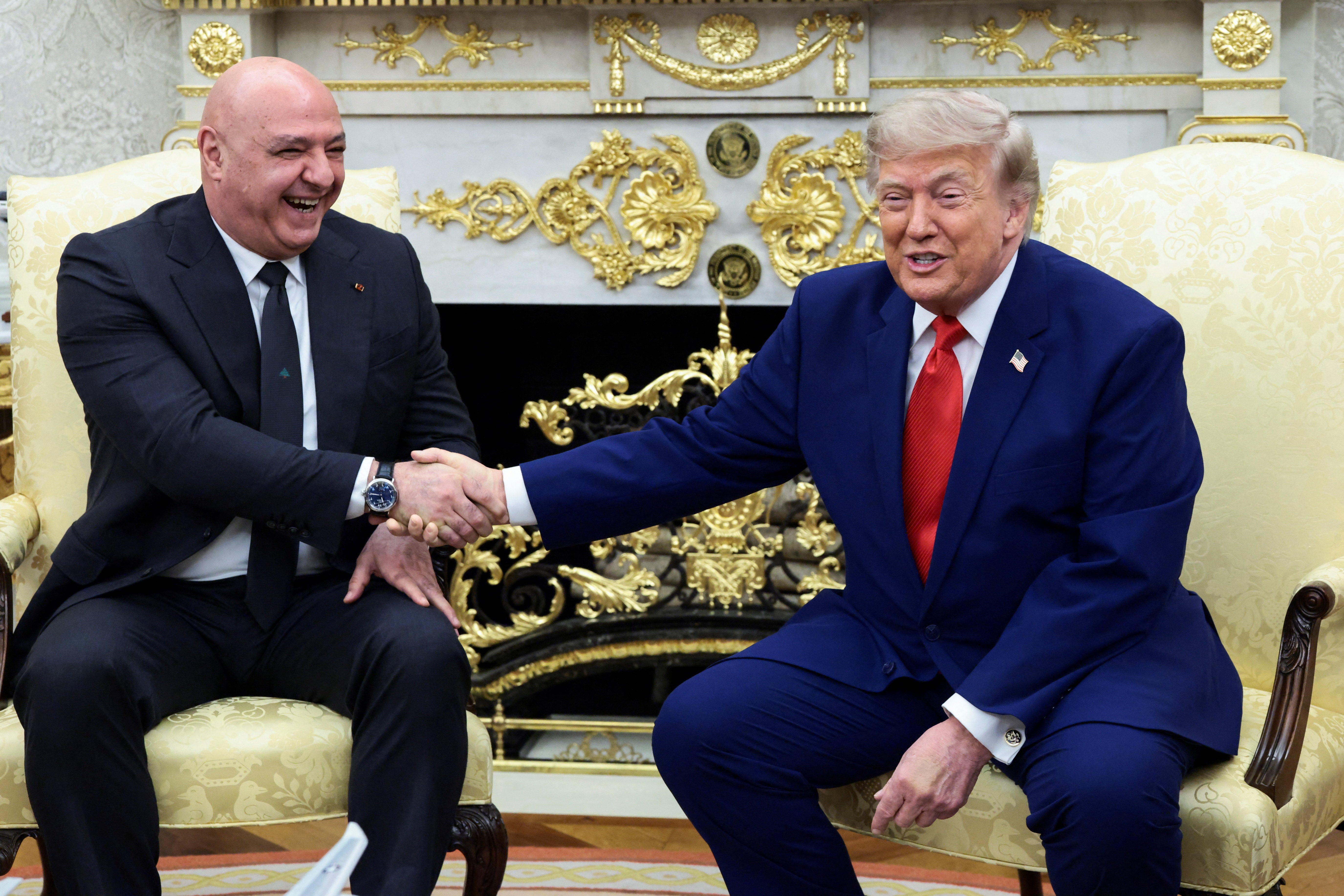 U.S. President Trump reacts, while shaking hands with Lebanese President Joseph Aoun, during their meeting in the Oval Office at the White House in Washington, D.C., U.S., July 21, 2026. (Reuters)