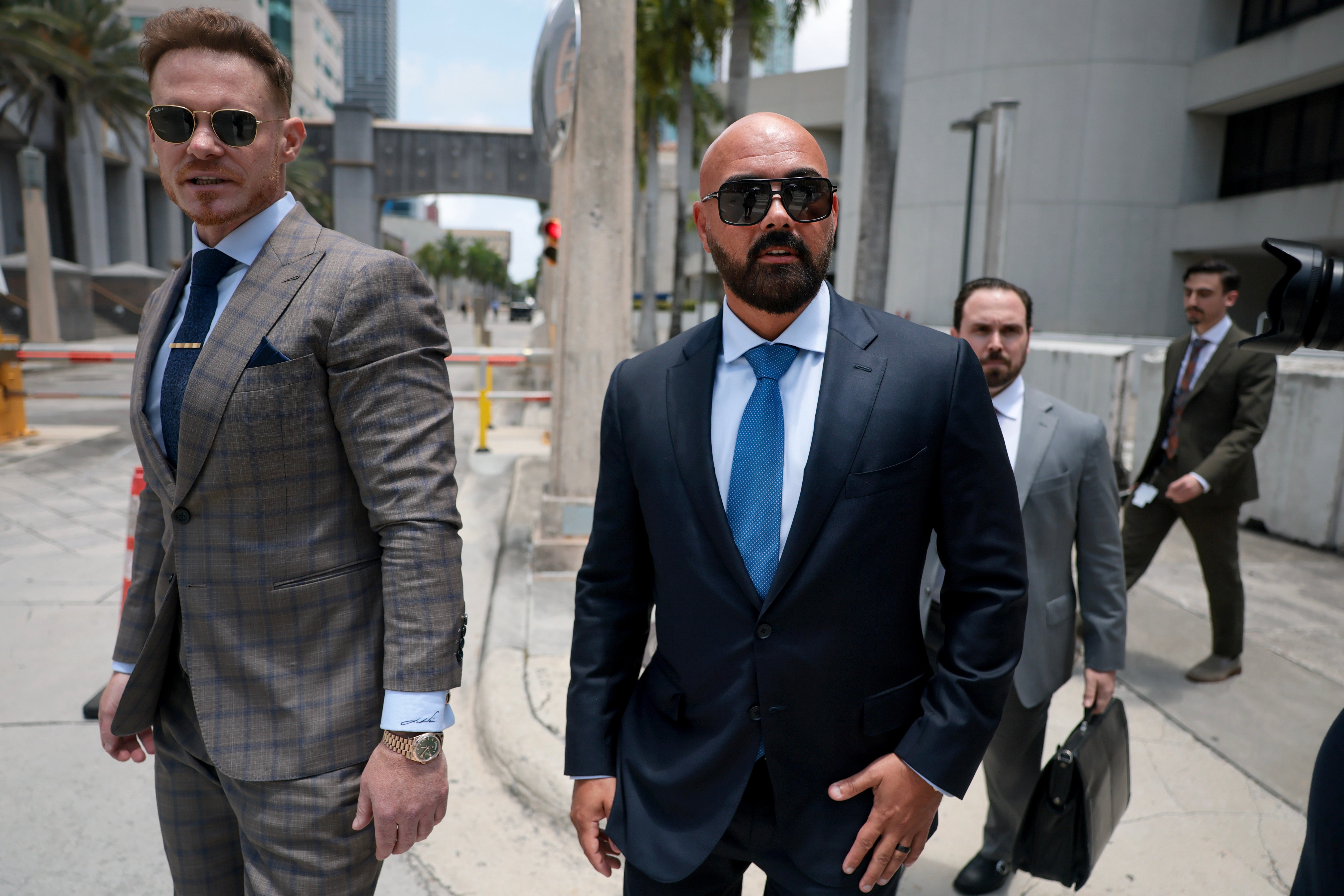 The Tates face extradition to Britain, where they’re accused of raping and trafficking women from 2010 to 2017