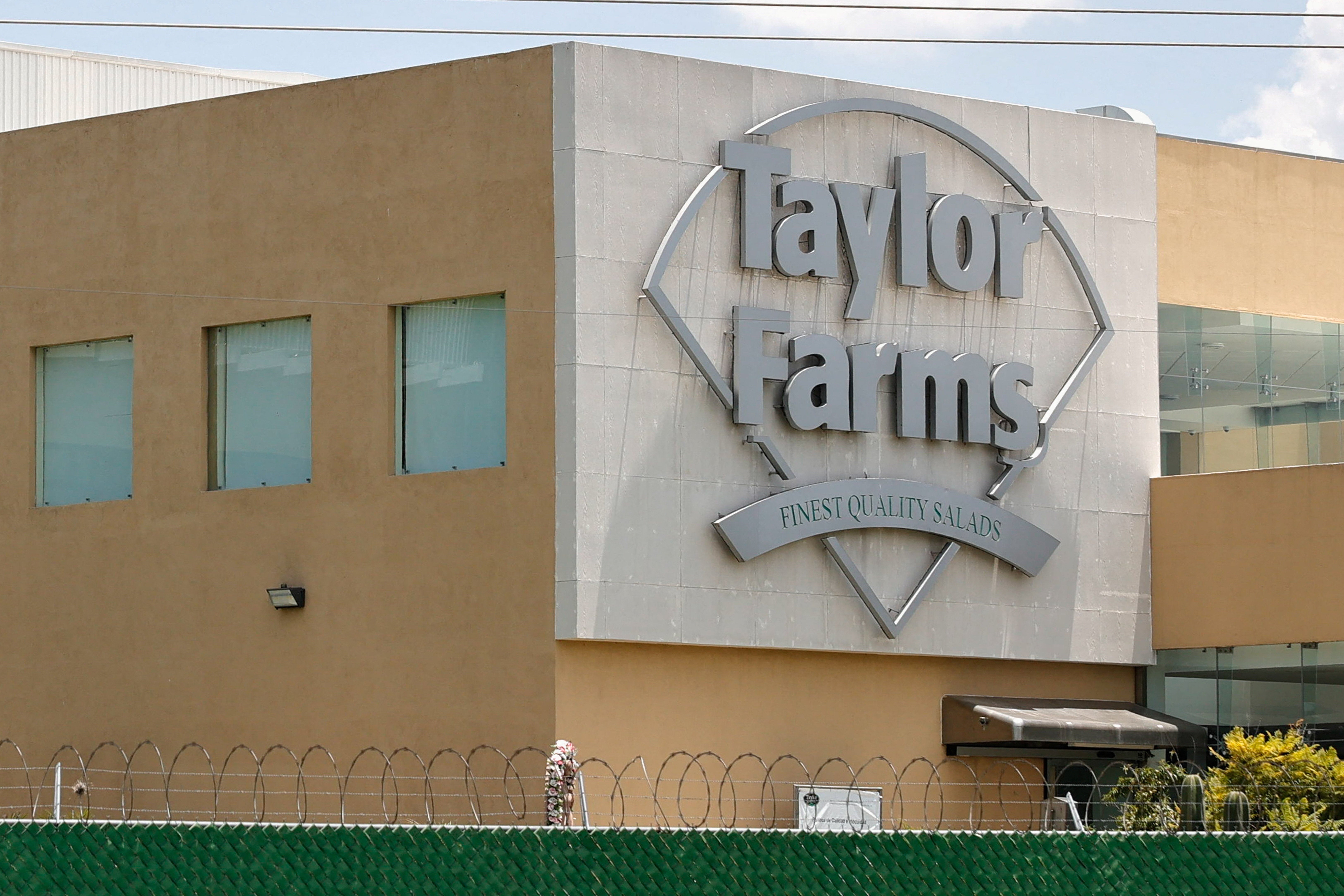 The US FDA said a 'false positive' during a lab test caused it to name Taylor Farms as the point of origin for the recent cyclosporiasis outbreak, but the company pushed back, saying none of its products had been definitively identified as carrying the Cyclospora parasite