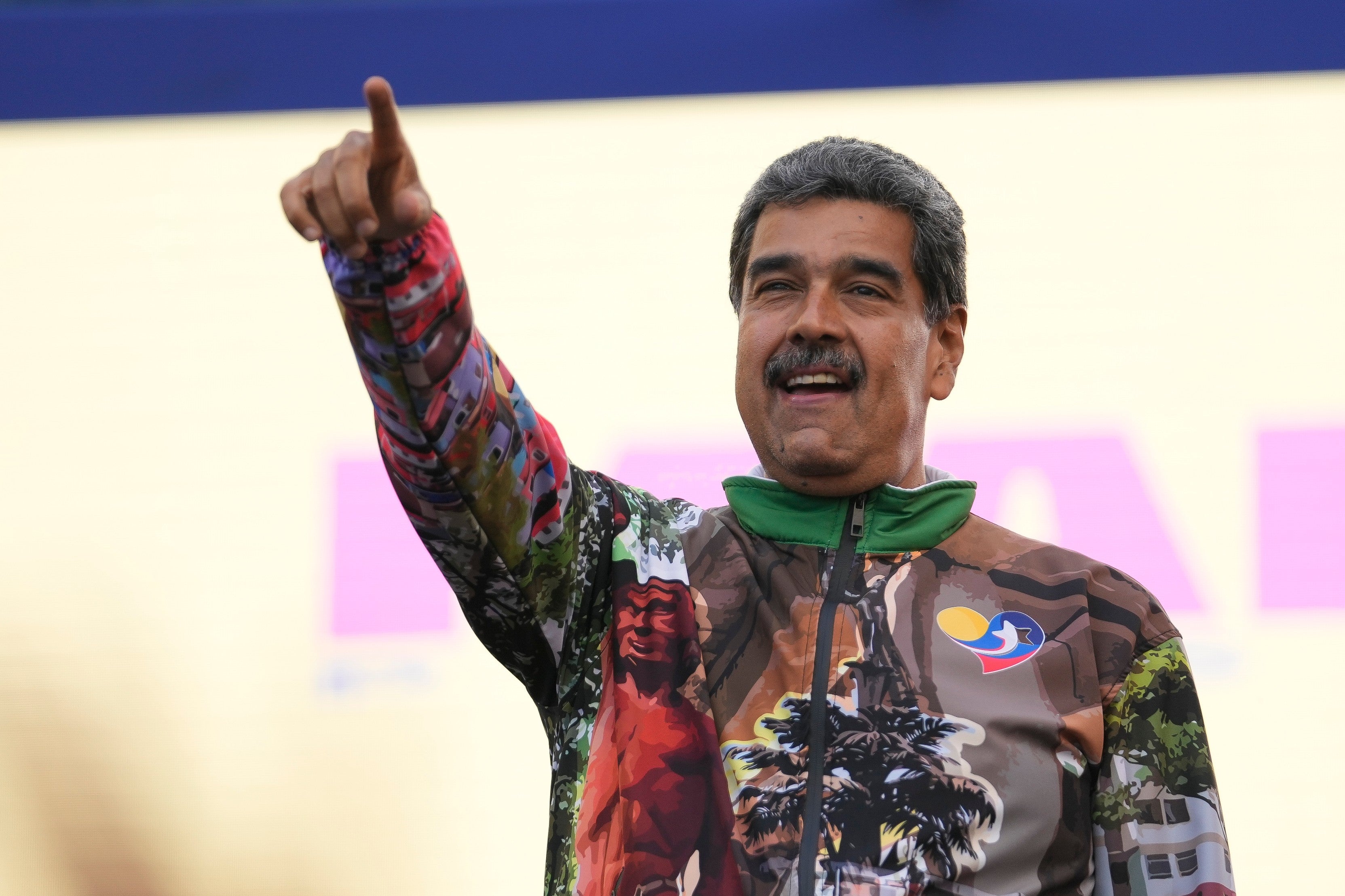 Maduro points to supporters during a campaign rally in the Catia neighborhood of Caracas, Venezuela, July 18, 2024