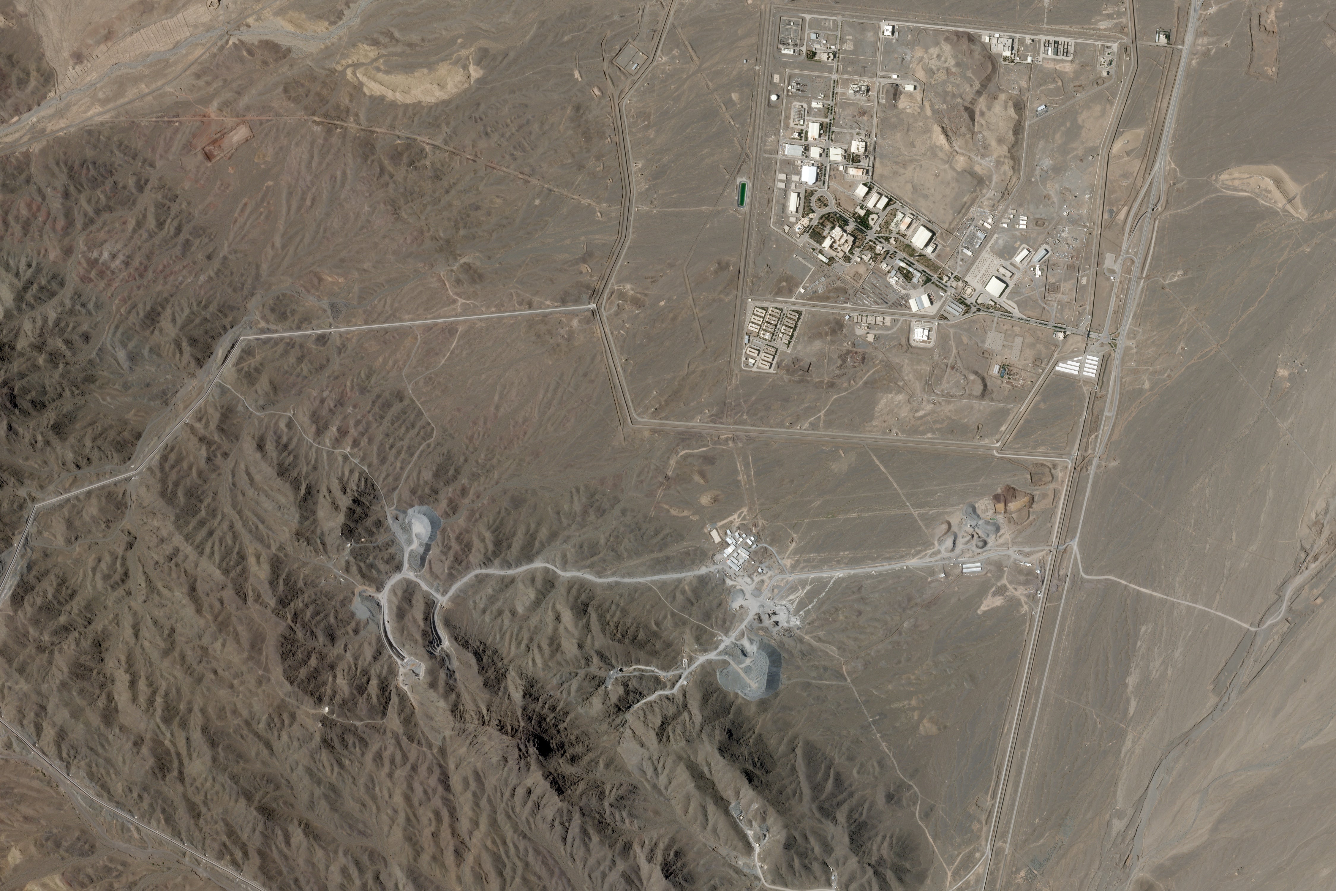 This June 15, 2026, photo from Planet Labs PBC shows Iran's Natanz nuclear enrichment facility, upper right, and the under-construction at Pickaxe Mountain directly to the south of it. (Planet Labs PBC via AP)