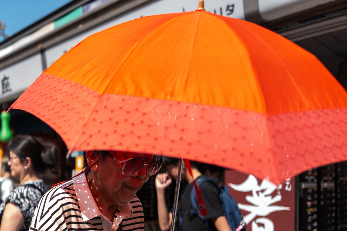 Japan records first ‘cruelly hot day’ as temperatures pass 40C