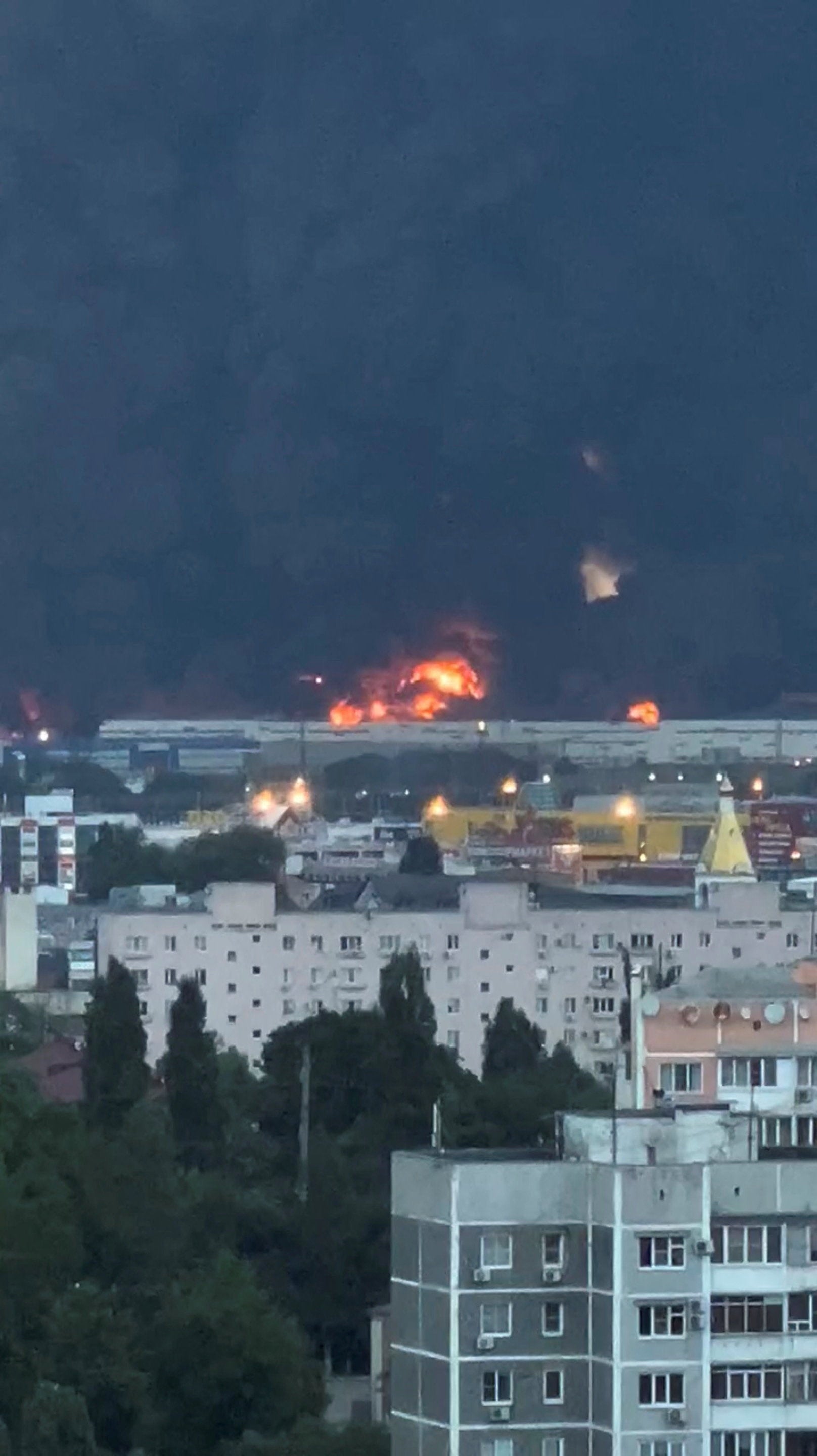 Smoke rises from a Wildberries warehouse on fire after an attack in Krasnodar (Reuters)
