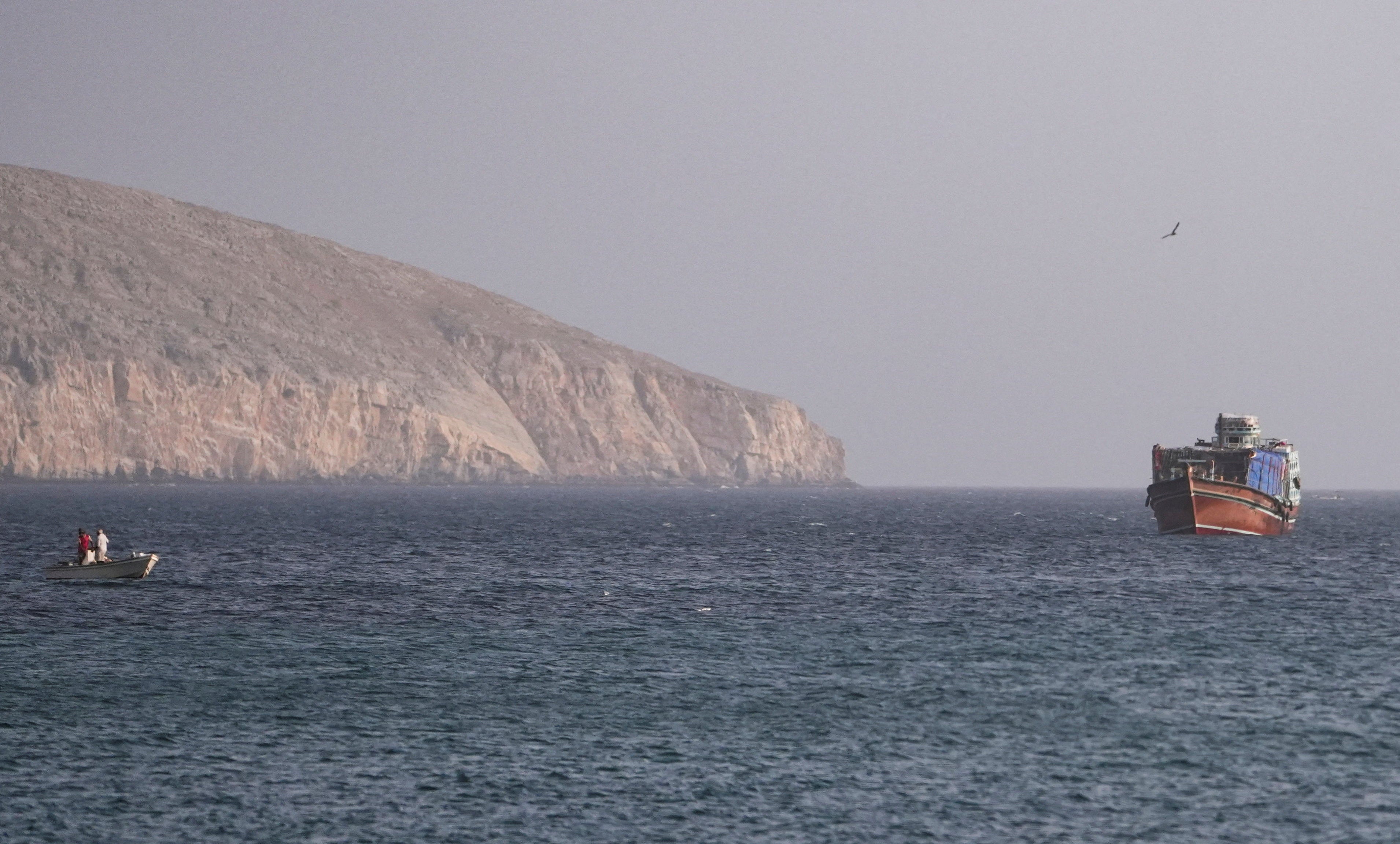 A vessel in the Strait of Hormuz, as seen from Musandam,Oman, July 16, 2026