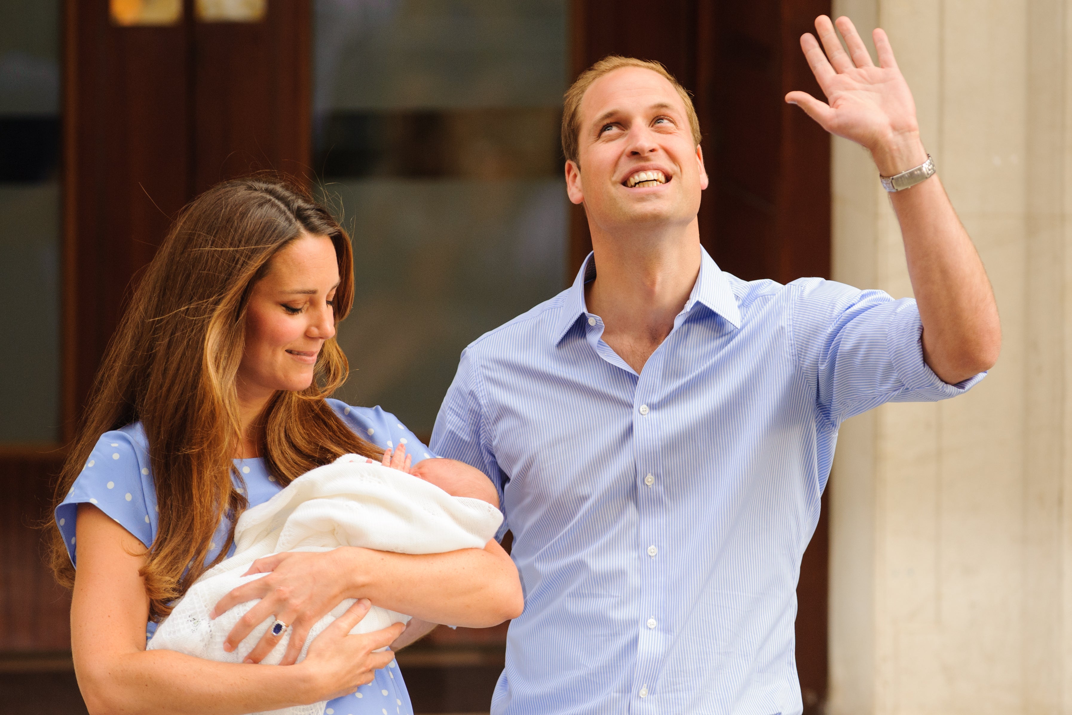 Kate and William leave St Mary's Hospital with the newborn Prince George on 23 July 2013 (PA)