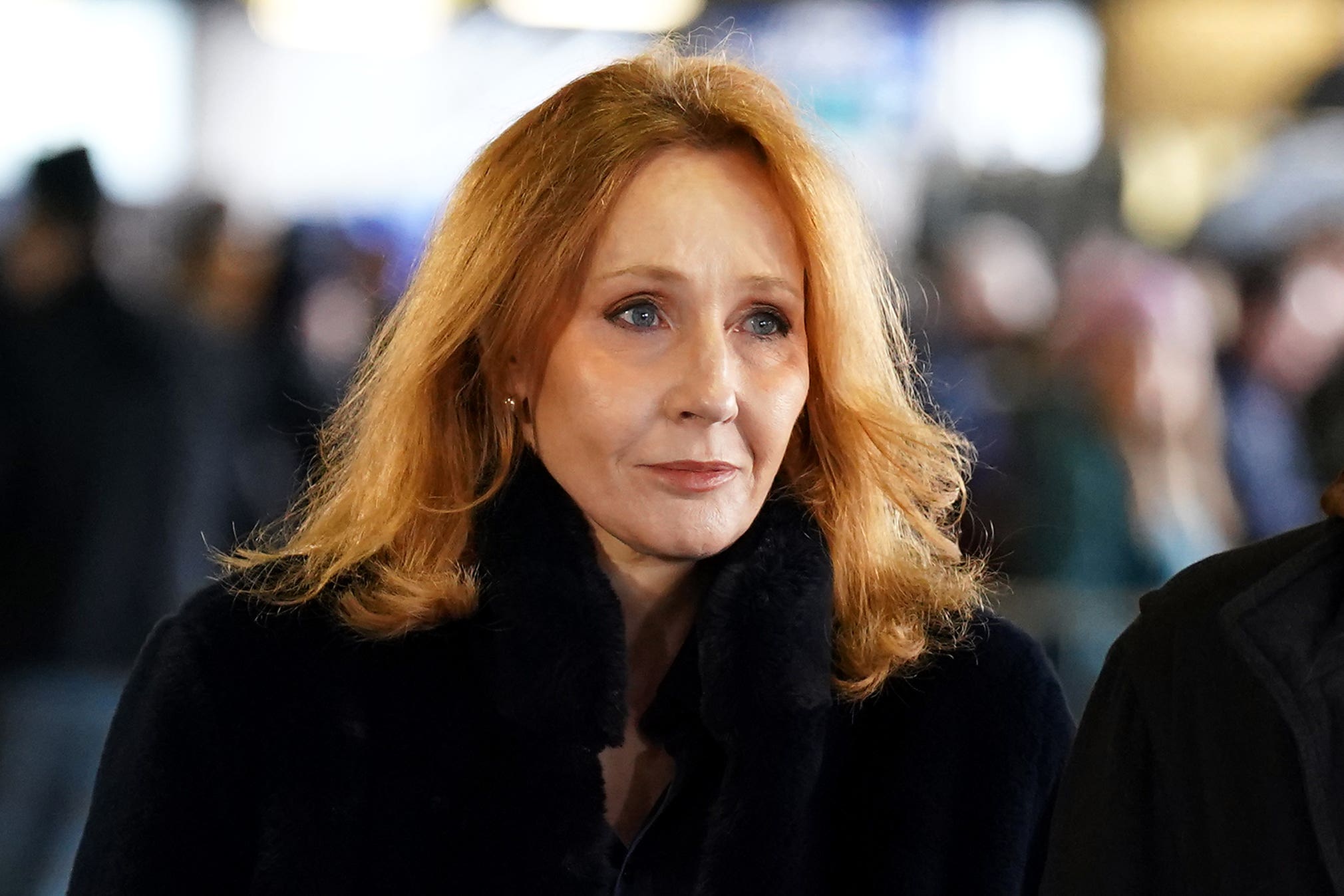 JK Rowling has been an outspoken critic of Ms Sturgeon (PA Archive)