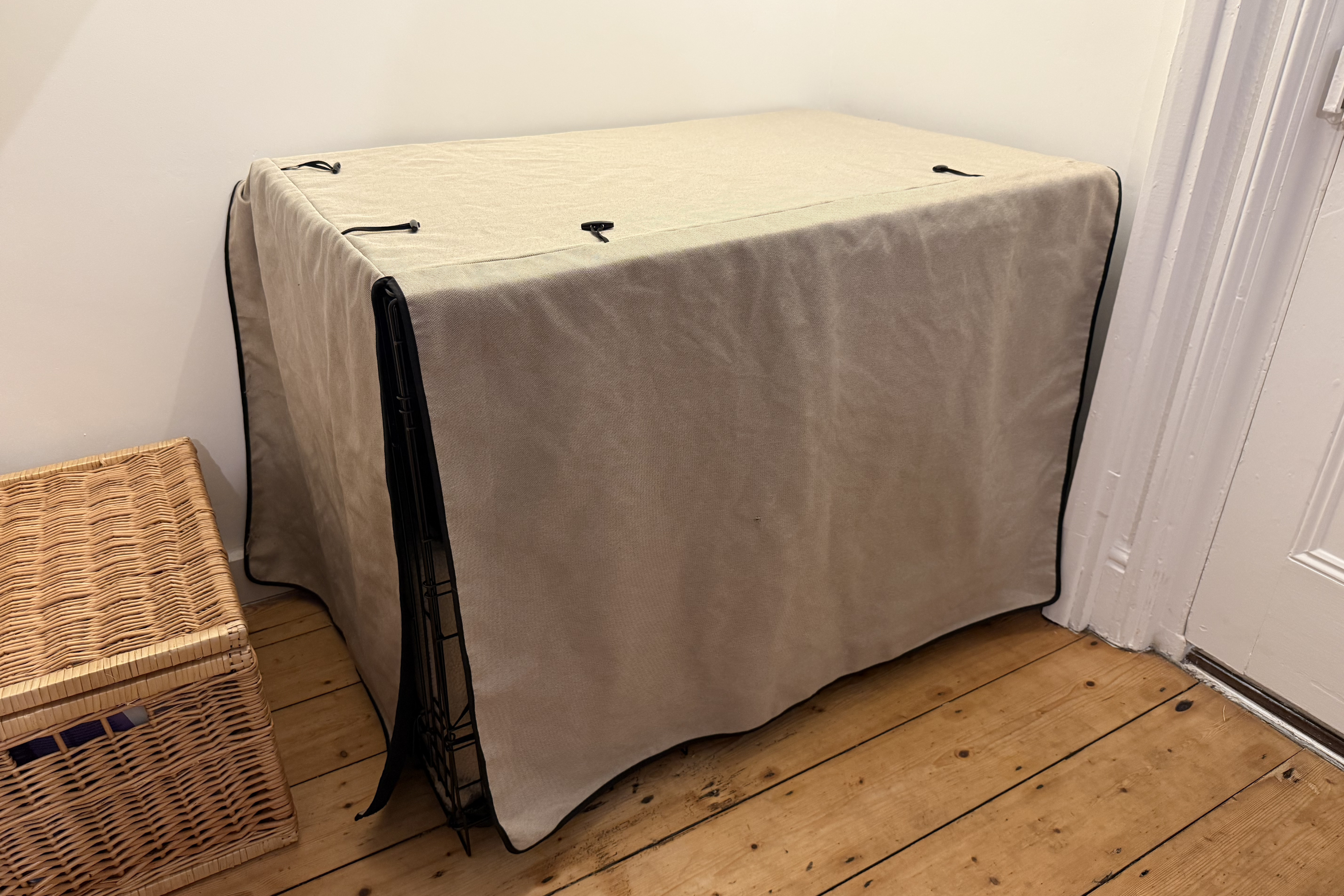 Whether it's bright outside or you're moving around the room, the flap-down covers keep things calm inside the crate (Lucy Smith/The Independent)