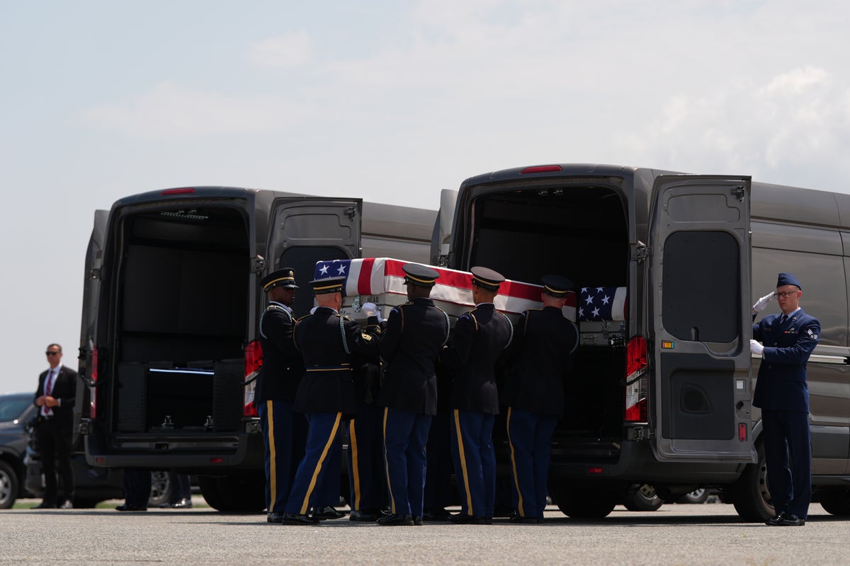 Trump attends transfer of fallen U.S. service members, in photos