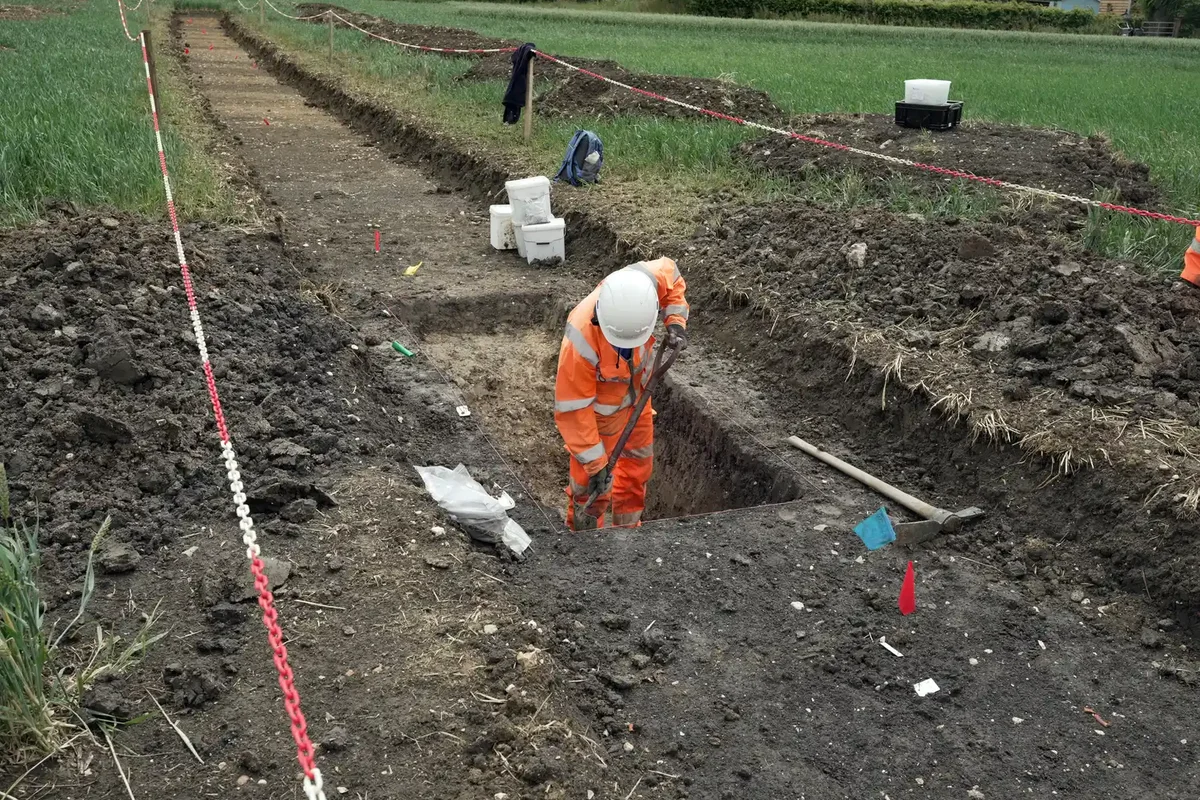 Archaeologists unearth rare Roman coin on railway site