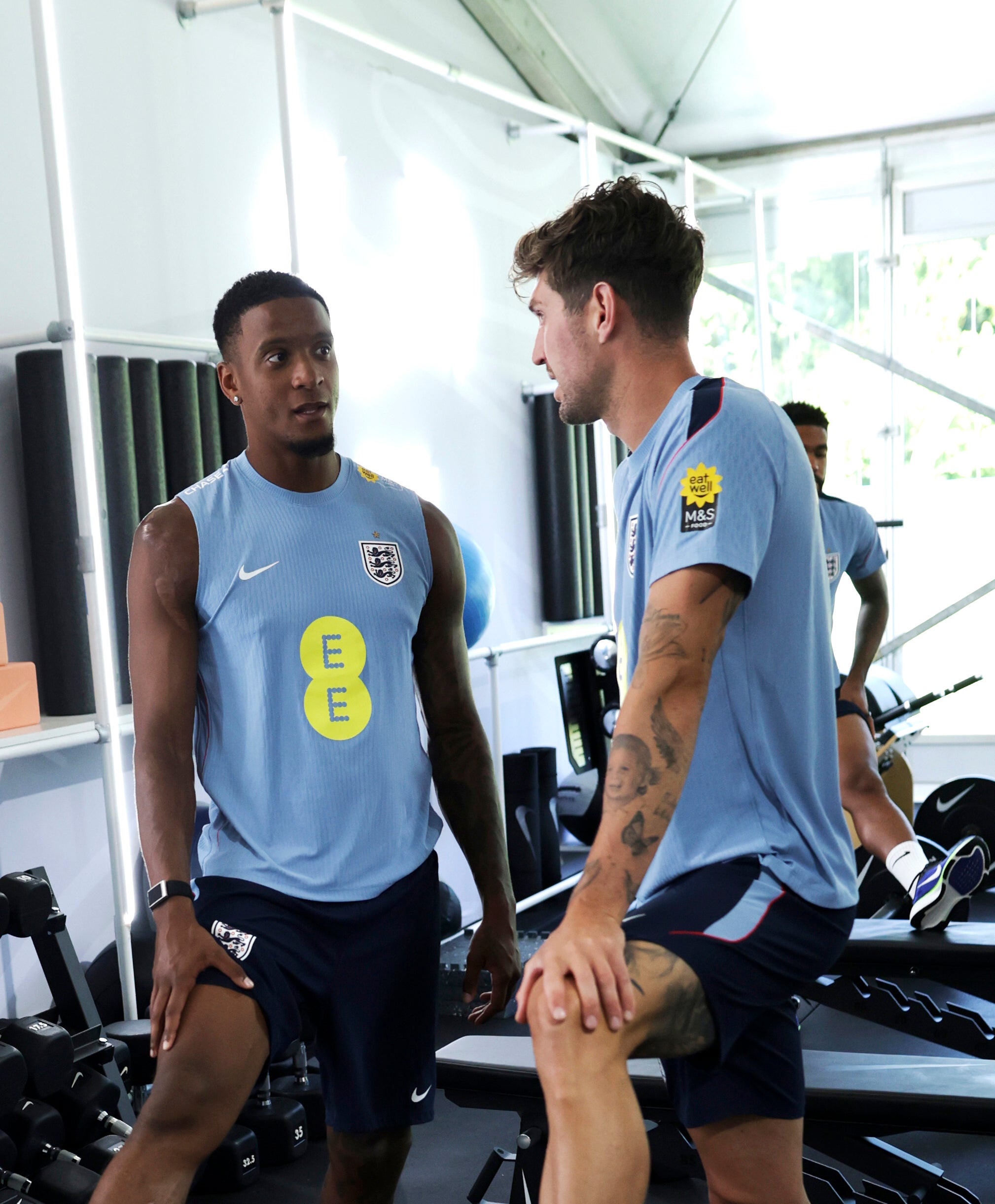 Ezri Konsa speaks to England teammate John Stones at the World Cup 2026 (Getty)
