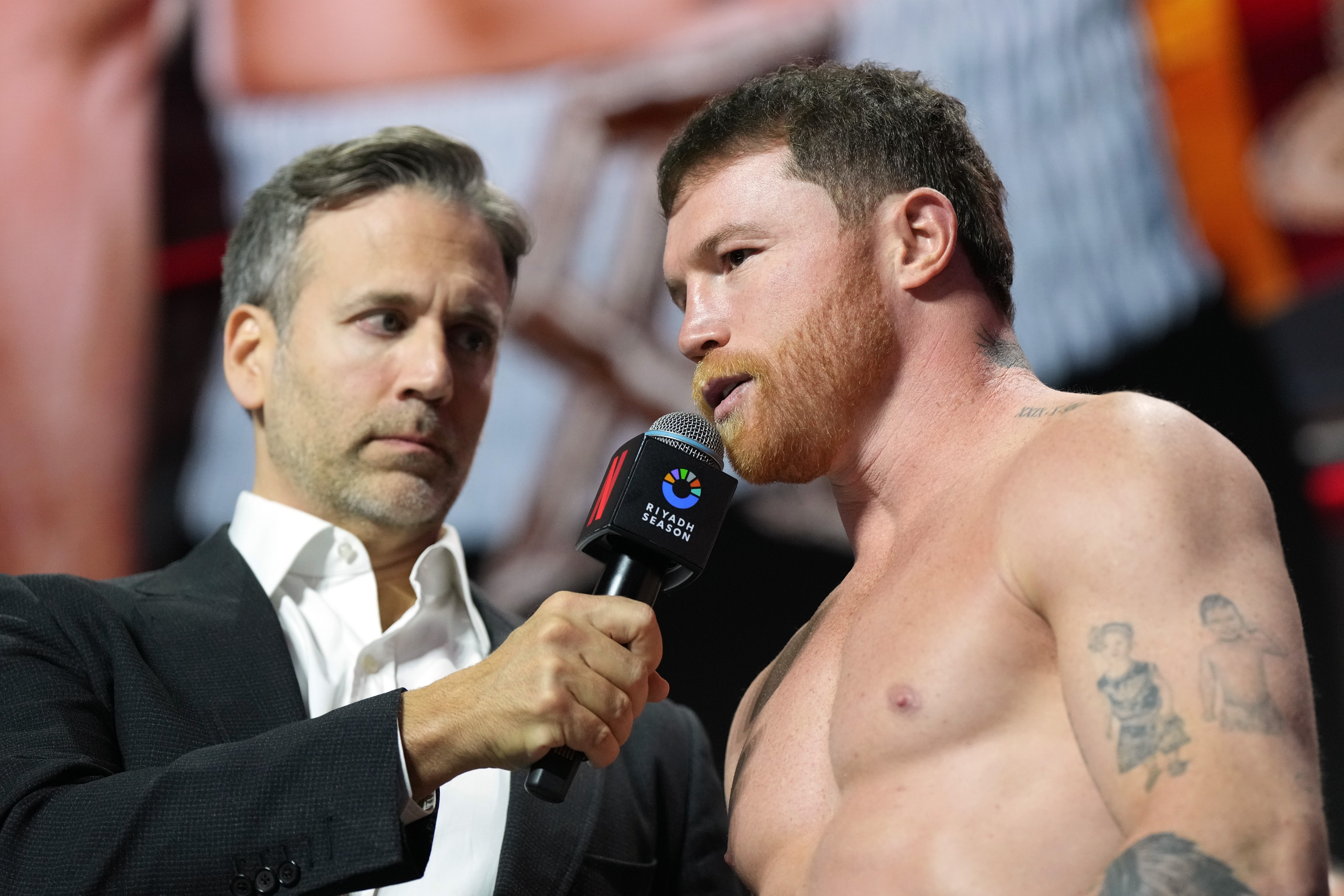 Canelo Alvarez (right) and Max Kellerman at the weigh-in for the Mexican's fight with Terence Crawford