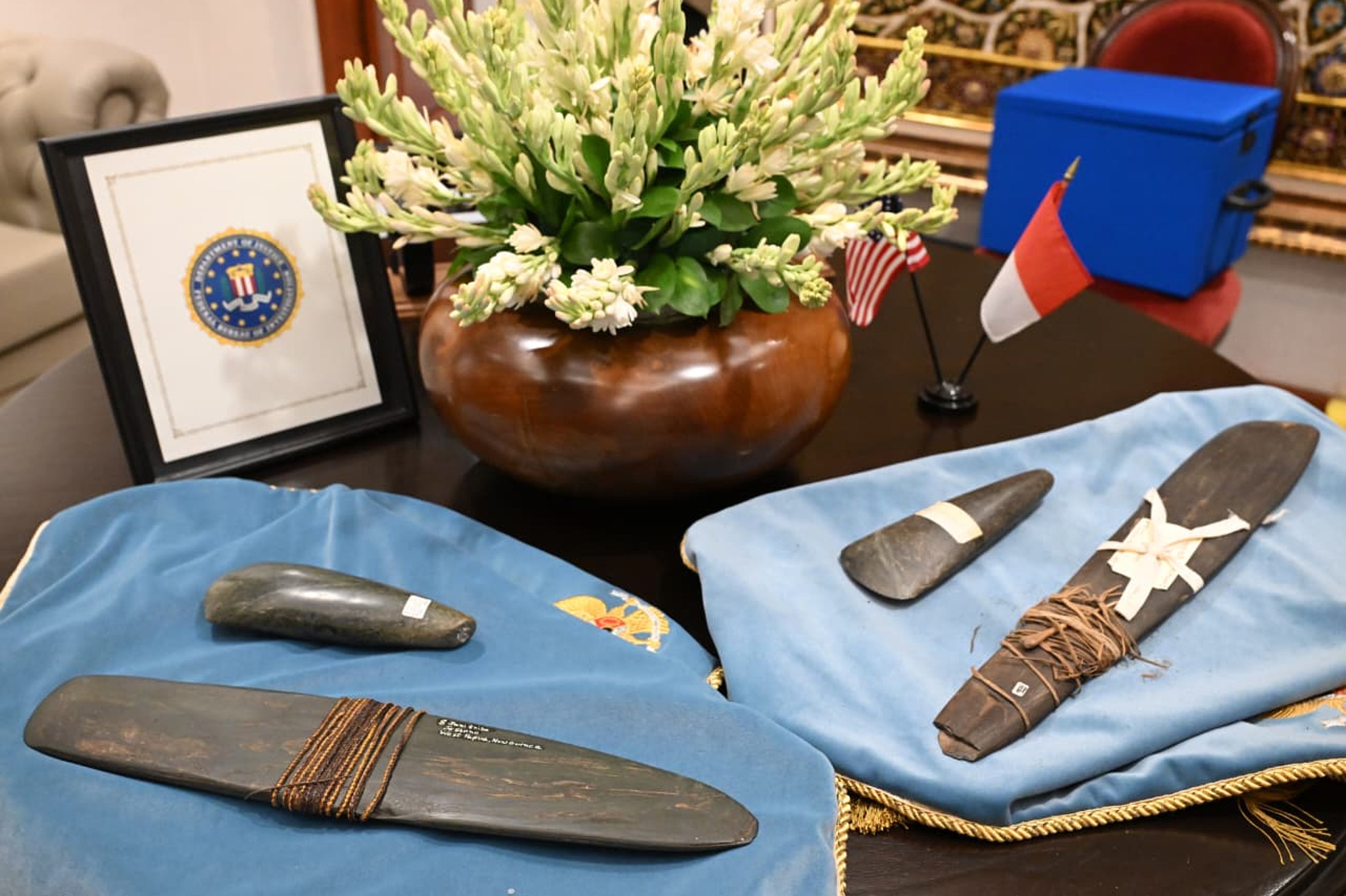 In this photo released by the Press, Media and Information Bureau of the Indonesian Presidential Secretariat, several repatriated artifacts are presented during the meeting between Indonesian President Prabowo Subianto and FBI Director Kash Patel in Jakarta