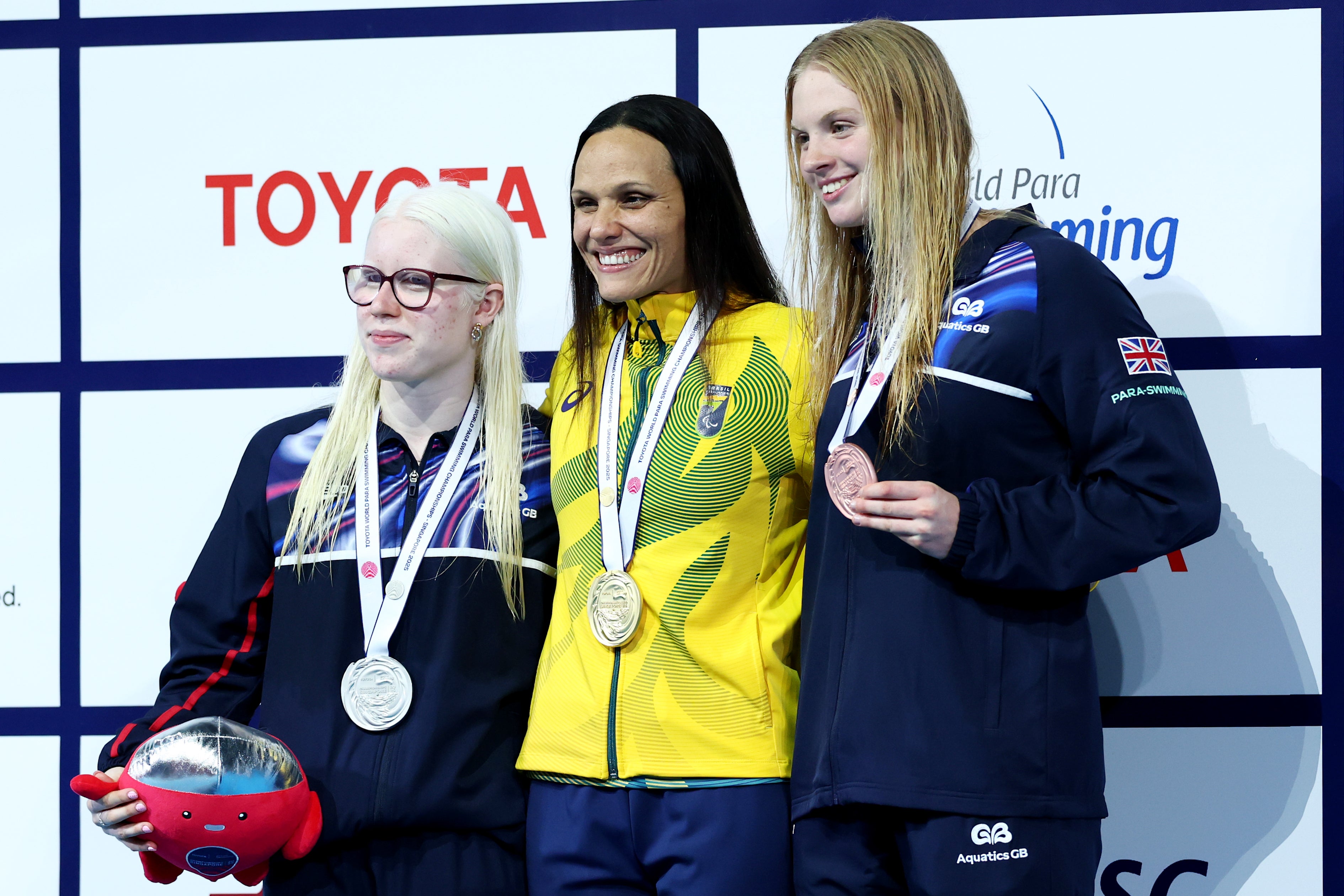 Astrid Carroll, right, wins bronze in the women’s 100m backstroke S12 at the 2025 World Para Swimming Championships
