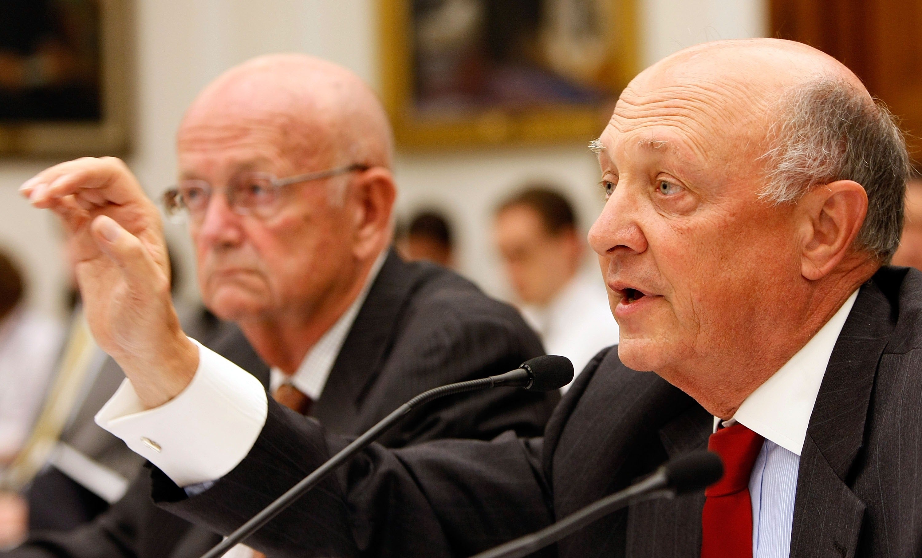 Woolsey (R) testifies during a hearing of the House Science and Technology Committee on Capitol Hill as former U.S. Army Chief of Staff Gen. Gordon Sullivan looks on September 27, 2007