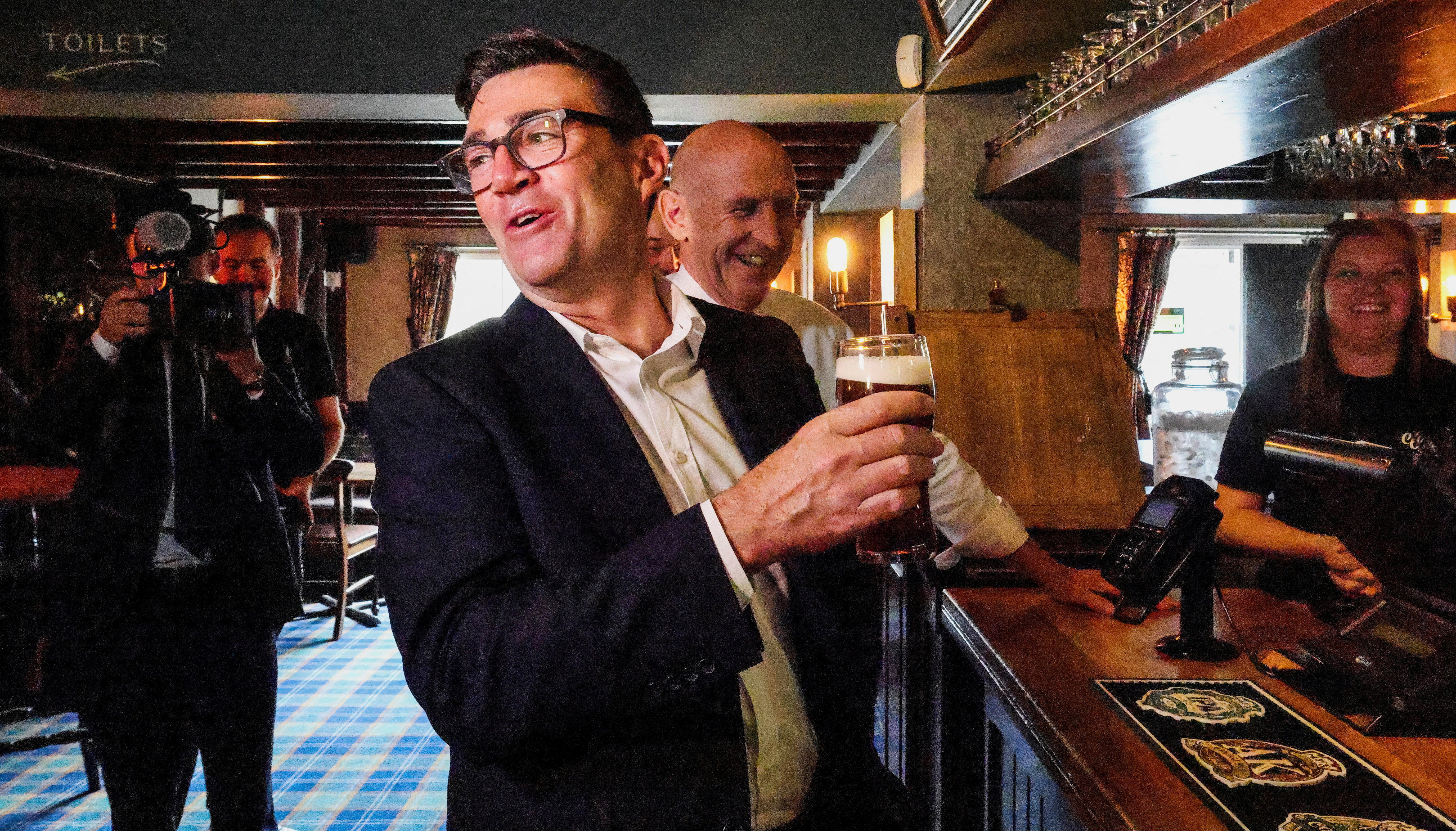 Andy Burnham visits the Hare Inn with chancellor John Healey, in Harlow, Essex