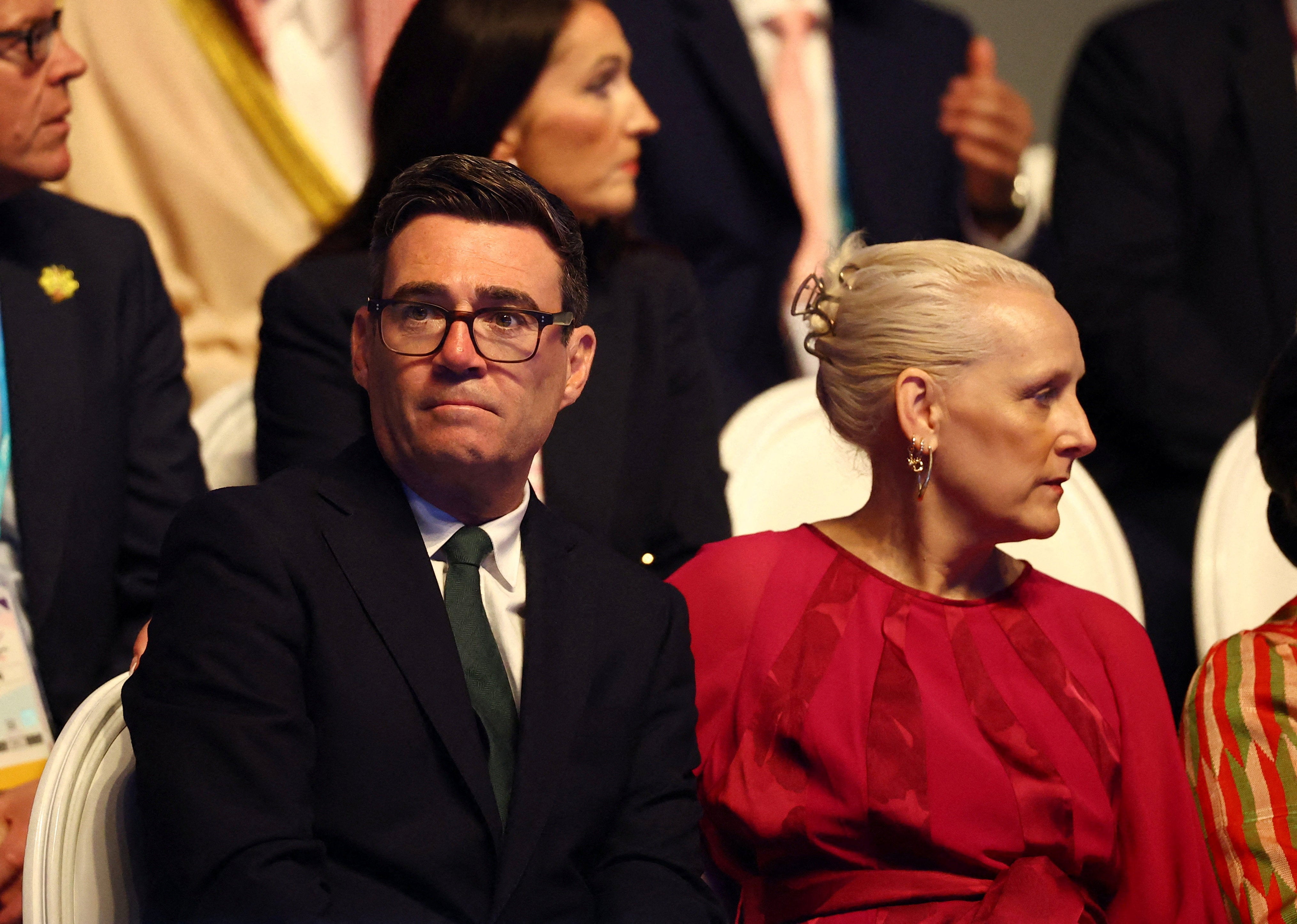 Prime Minister Andy Burnham in the stands with his wife Marie-France van Heel (Reuters)