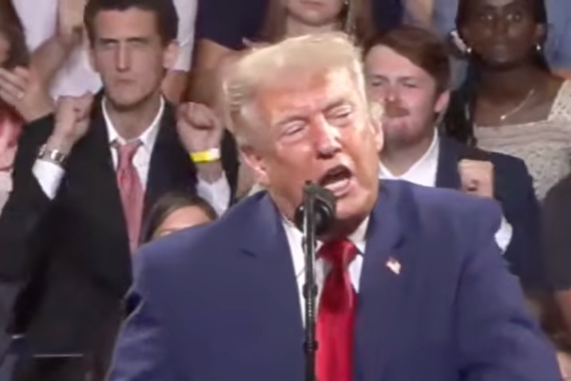 At one point he copies Trump's fist-pumping dance, which the president has been known to deploy on stage (RSBN)