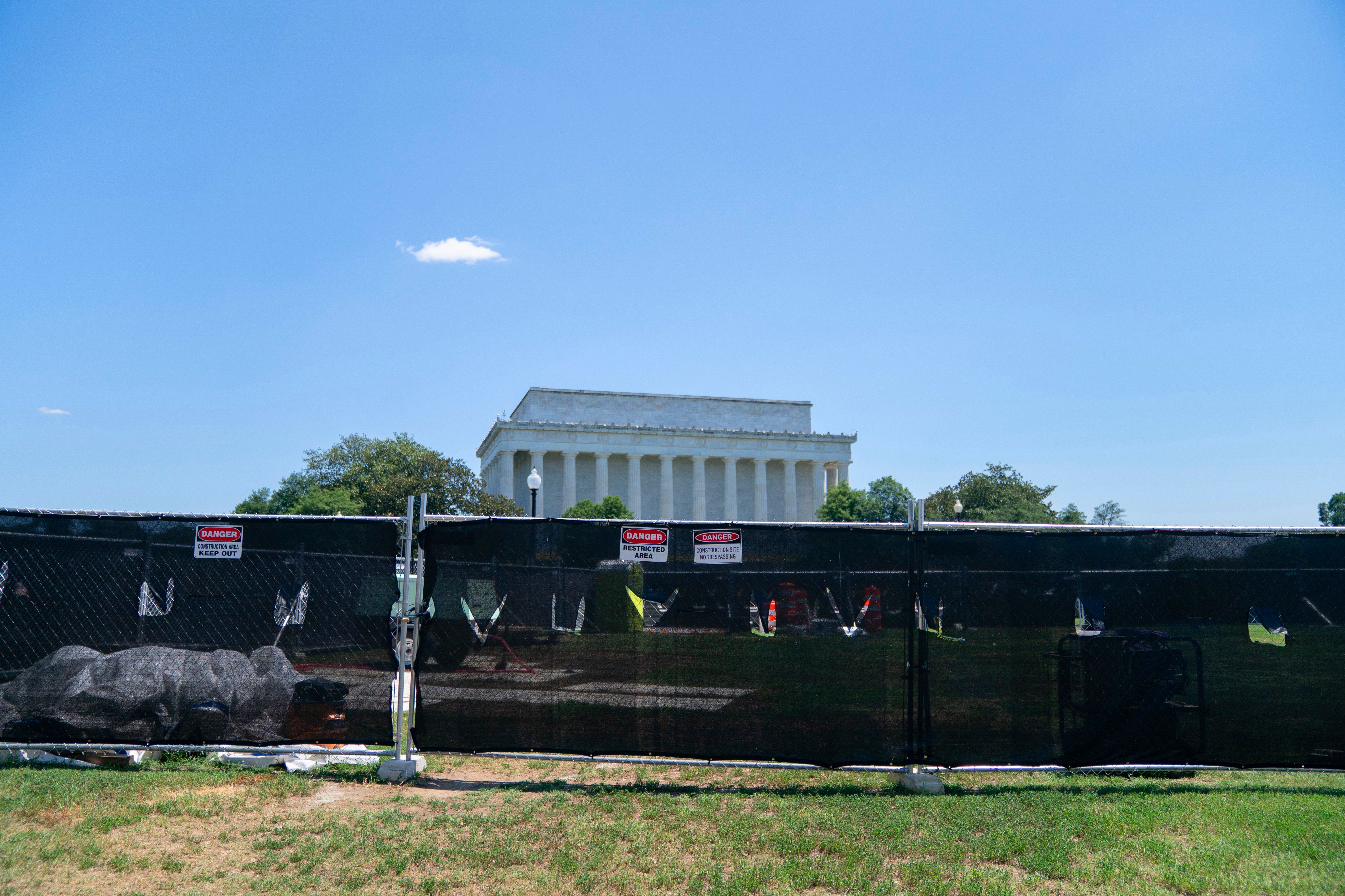 The repairs to the pool — and the ensuing controversy around them — have turned the site into an even bigger tourist attraction, and park police and National Guard troops have patrolled around its exterior