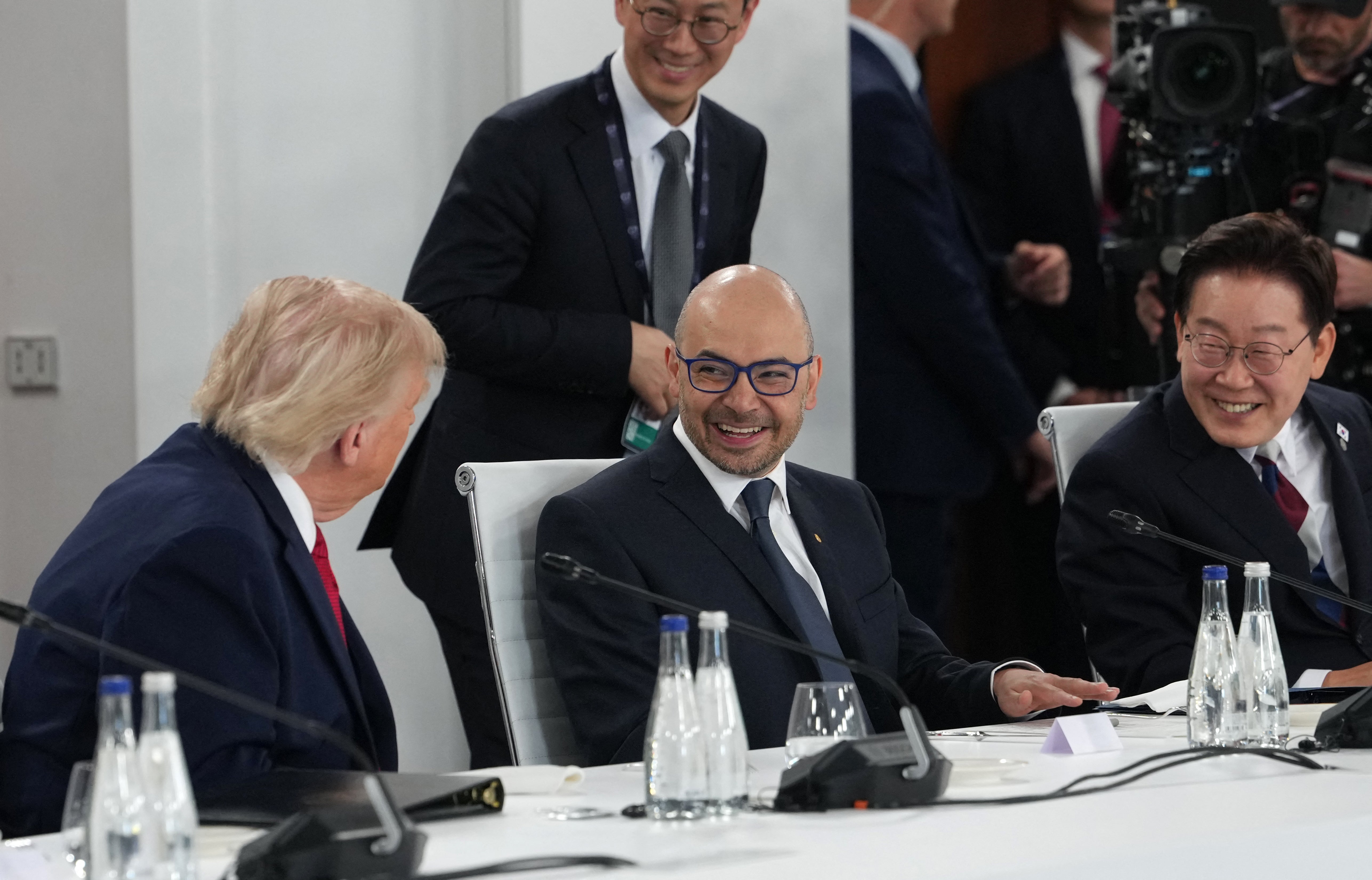 US president Donald Trump, left, and South Korean leader Lee Jae Myung, right, during a working lunch meeting of G7 members in Evian, France, on 17 June 2026
