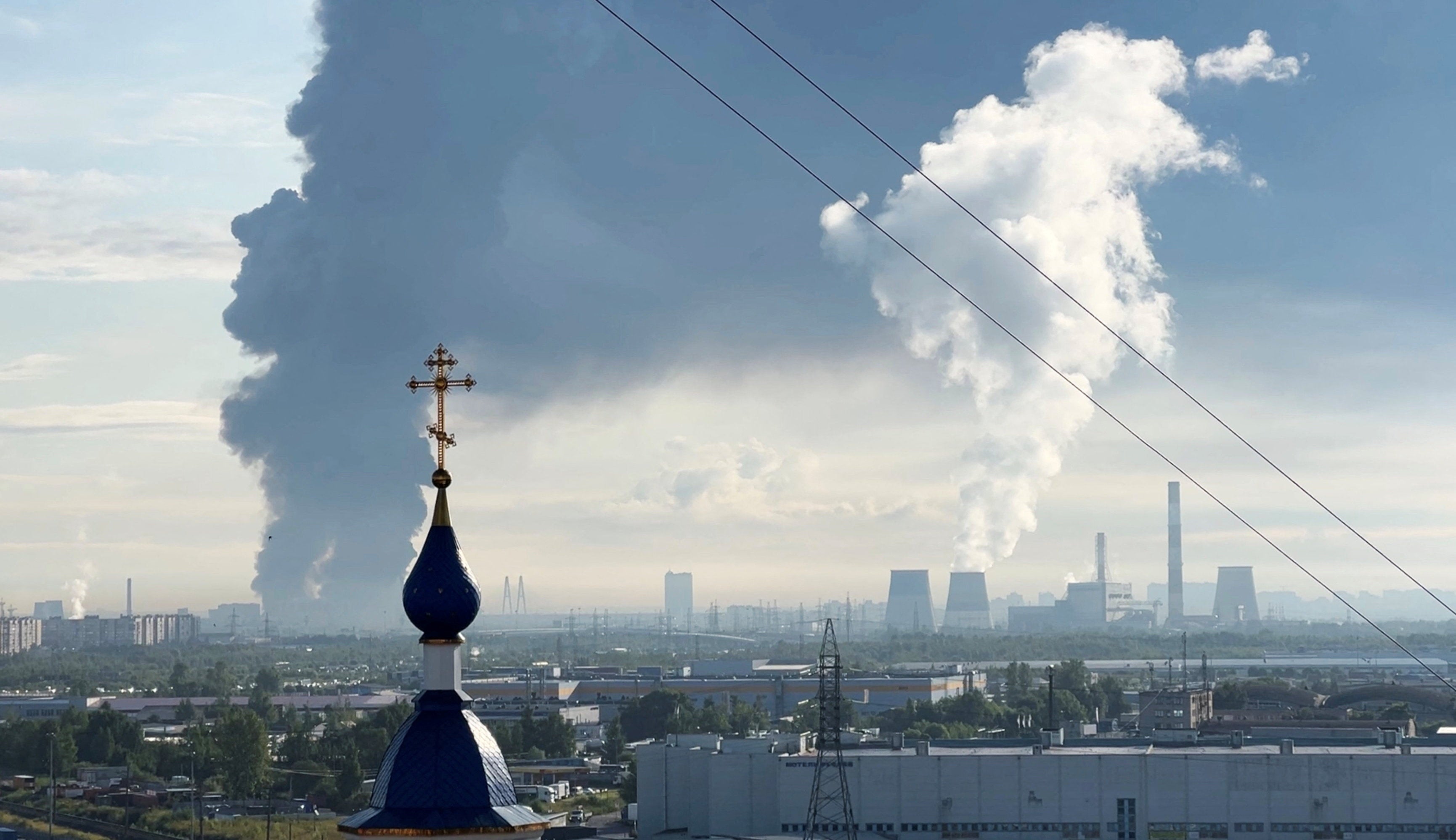 Smoke billows from the burning Wildberries warehouse following a Ukrainian drone attack, according to local authorities, in the course of the Russia-Ukraine conflict, in Saint Petersburg, Russia July 24, 2026, in this still image taken from video. (Reuters)