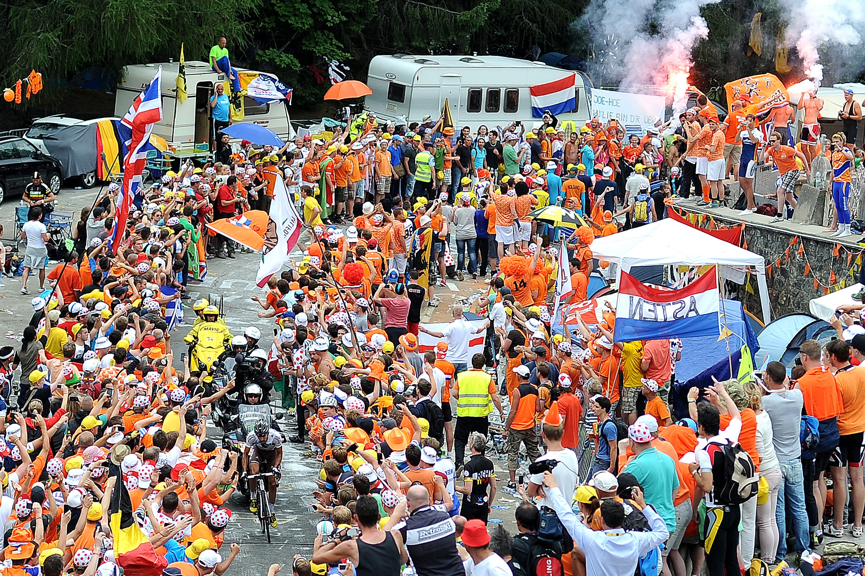 Fans flood Alpe d'Huez when the Tour de France visits, including at 