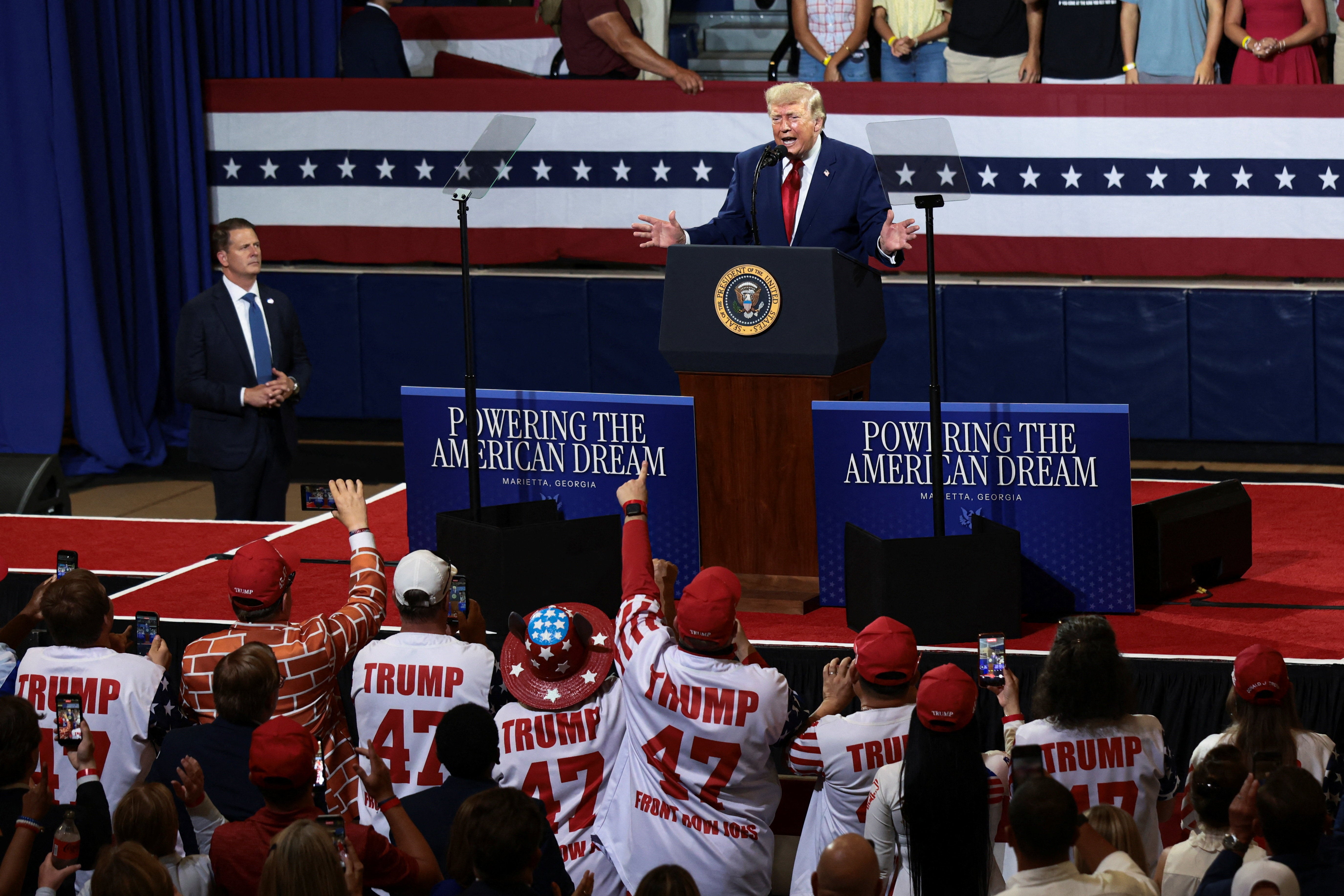 President Donald Trump hails his loyal ‘Front Row Joes’ at Georgia rally but one ex-member felt patronized