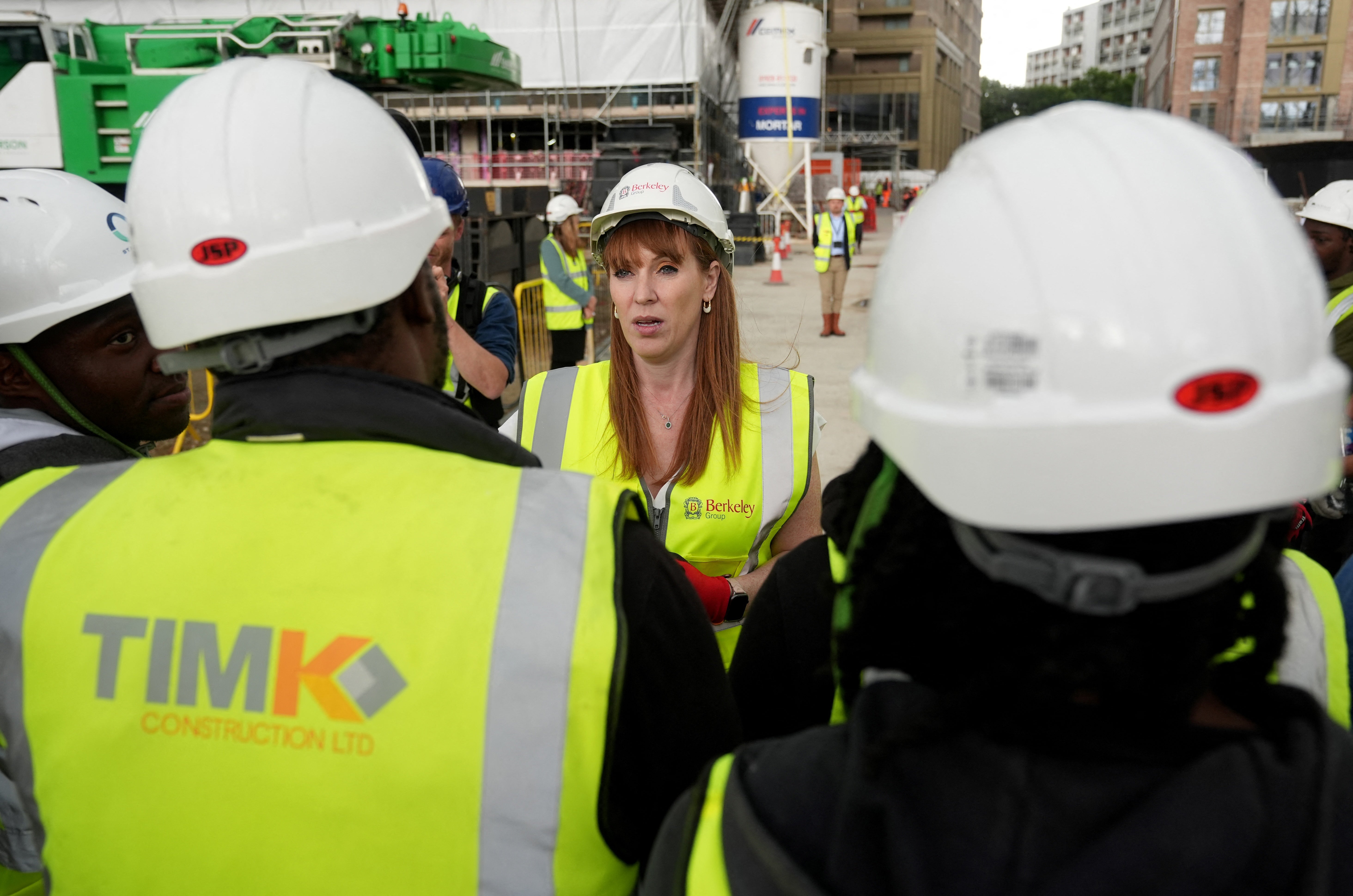 Andy Burnham’s newly appointed housing minister denied she was abandoning the commitment, but compared achieving it to her chances of “running the London Marathon”