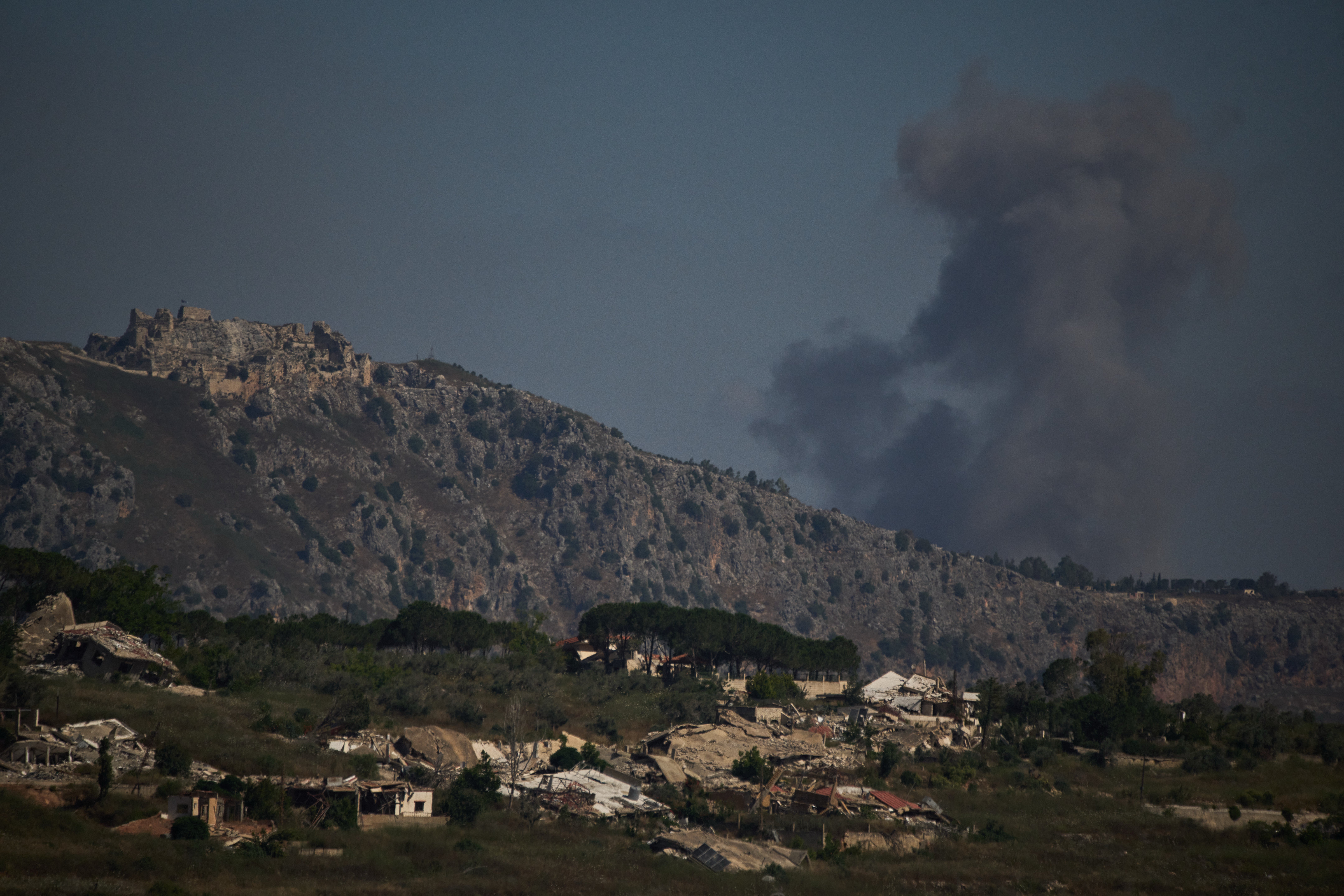 Smoke rises to the sky in an area near Beaufort Castle following an Israeli military strike in southern Lebanon as seen from northern Israel, Friday, June 19, 2026. (AP Photo/Leo Correa, File)