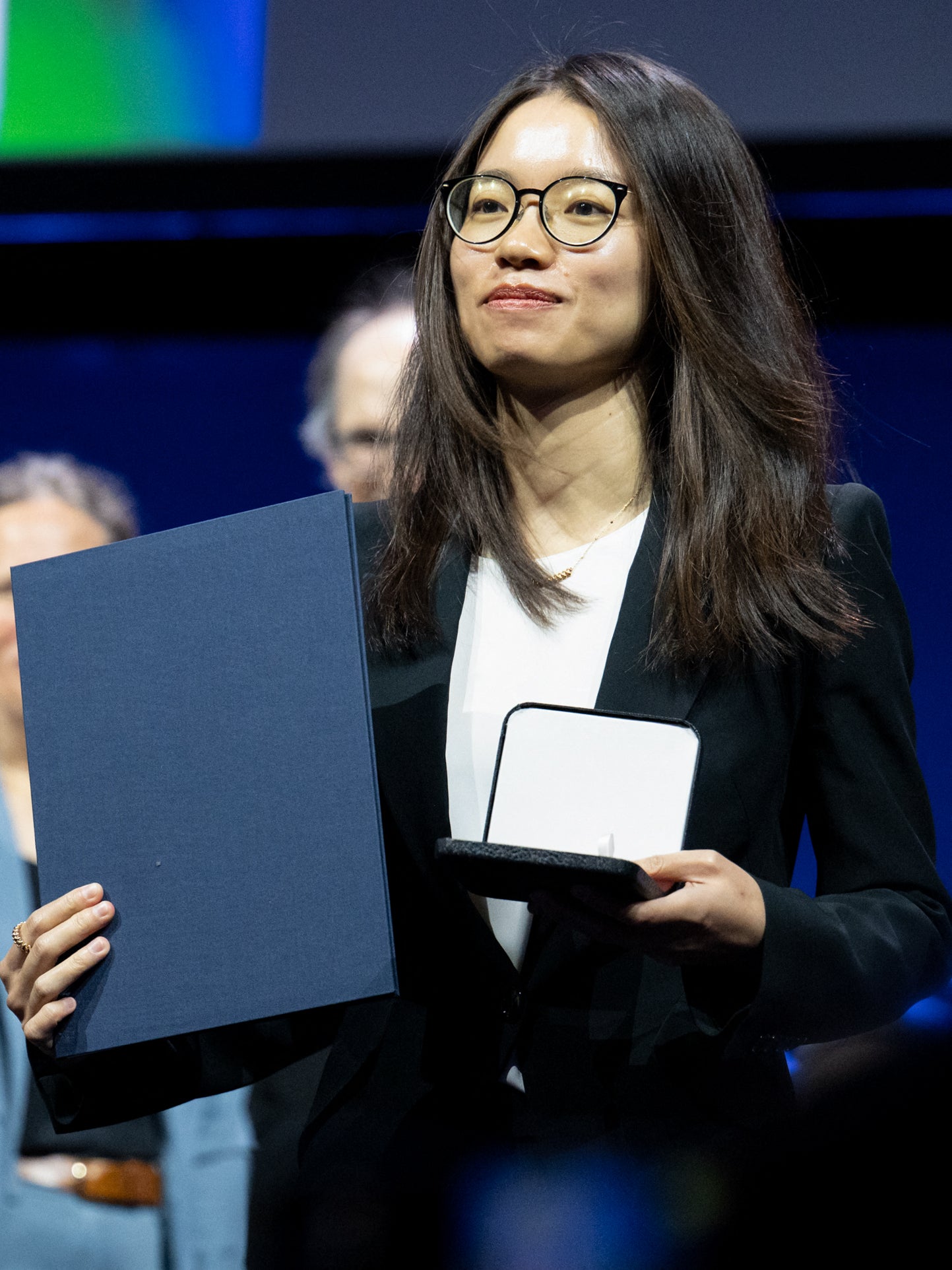 Chinese mathematician Hong Wang poses as she is awarded the 2026 Fields Medal during the International Congress of Mathematicians in Philadelphia