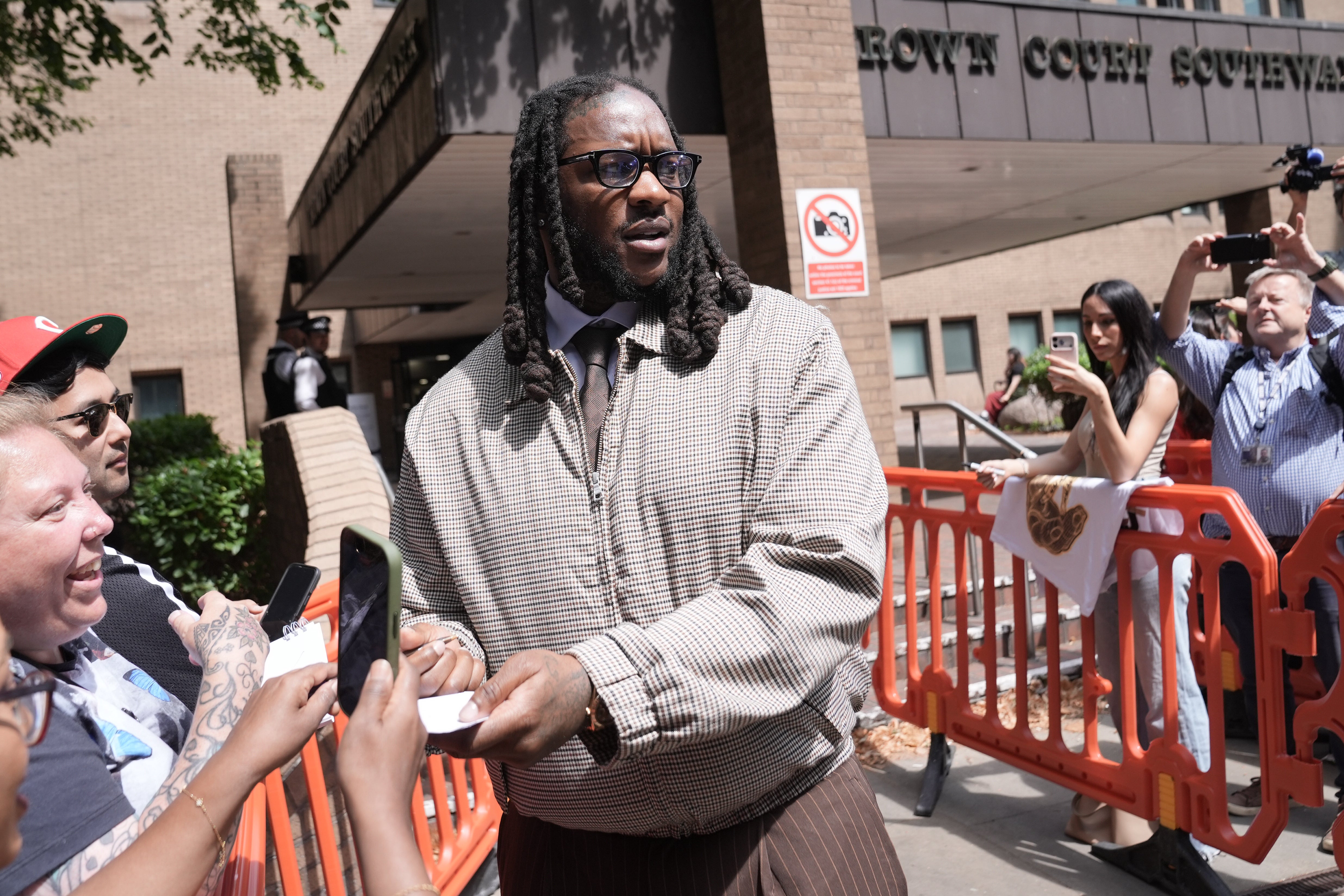 Omololu Akinlolu leaving Southwark Crown Court, south London, where he has pleaded guilty, alongside R&B singer Chris Brown, to affray after a confrontation at a Mayfair club in 2023