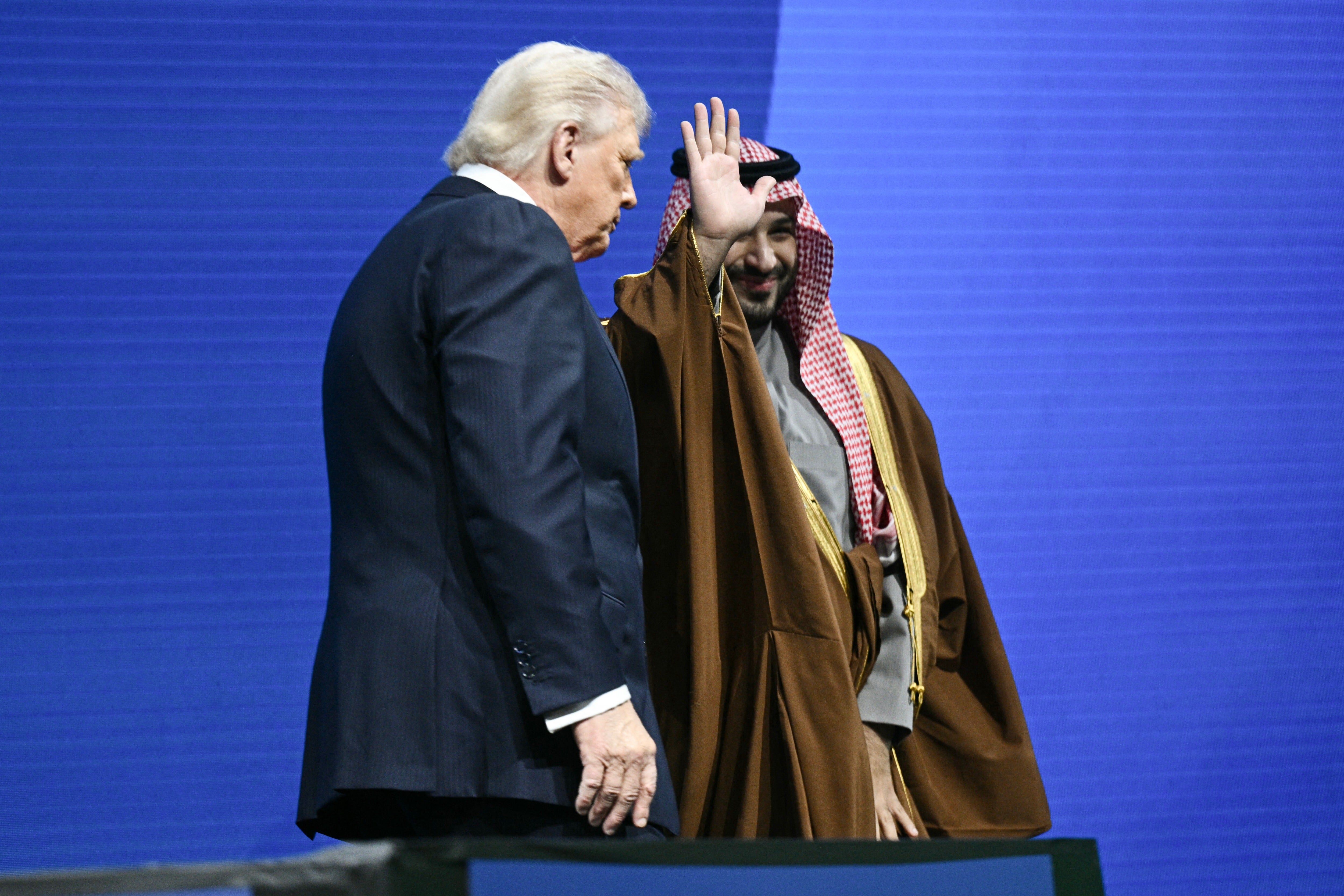 Trump’s post post surprised the Saudi officials, who had not signed on to the requirement of normalization with Israel, according to CNN . Pictured: Crown Prince and Prime Minister of the Kingdom of Saudi Arabia Mohammed bin Salman and Trump speak during the US-Saudi Investment Forum at the John F. Kennedy Center for the Performing Arts on November 19, 2025.