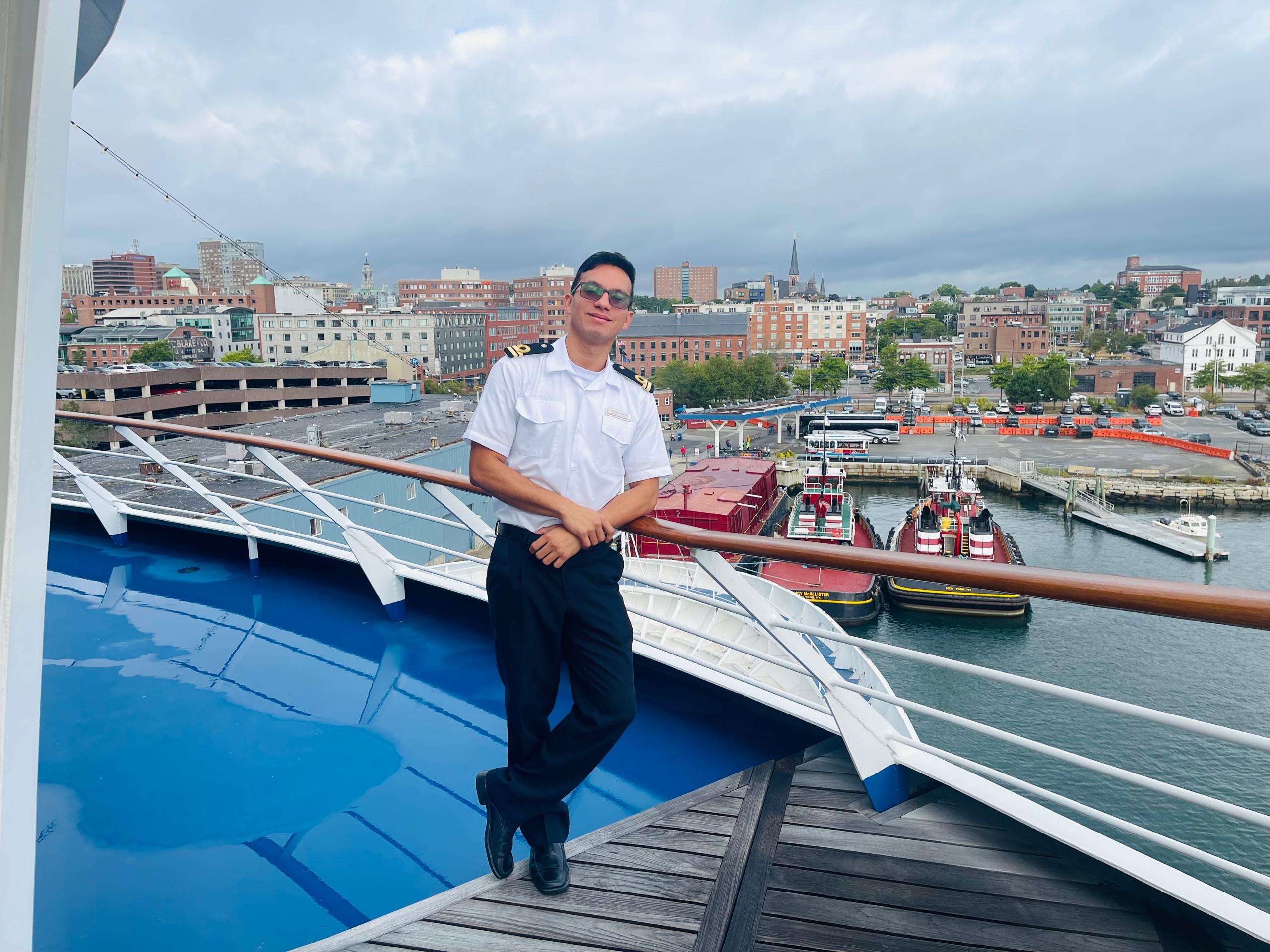 Cedeño, pictured while working on a cruise ships before the earthquake, says that the impact of the disaster has been 'heartbreaking'