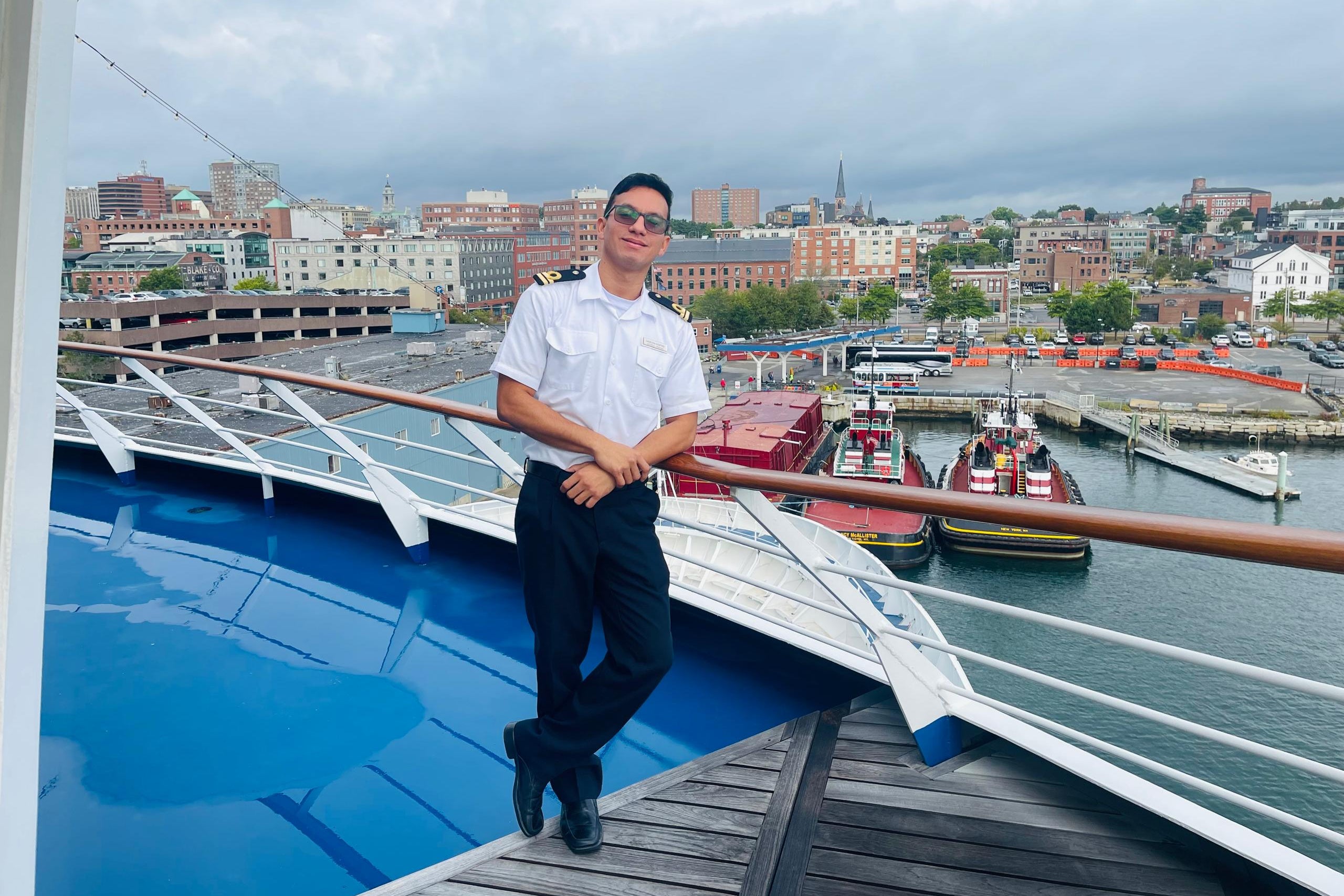 Cedeño, pictured while working on a cruise ships before the earthquake, says that the impact of the disaster has been ‘heartbreaking’ (Saddam Cedeño)