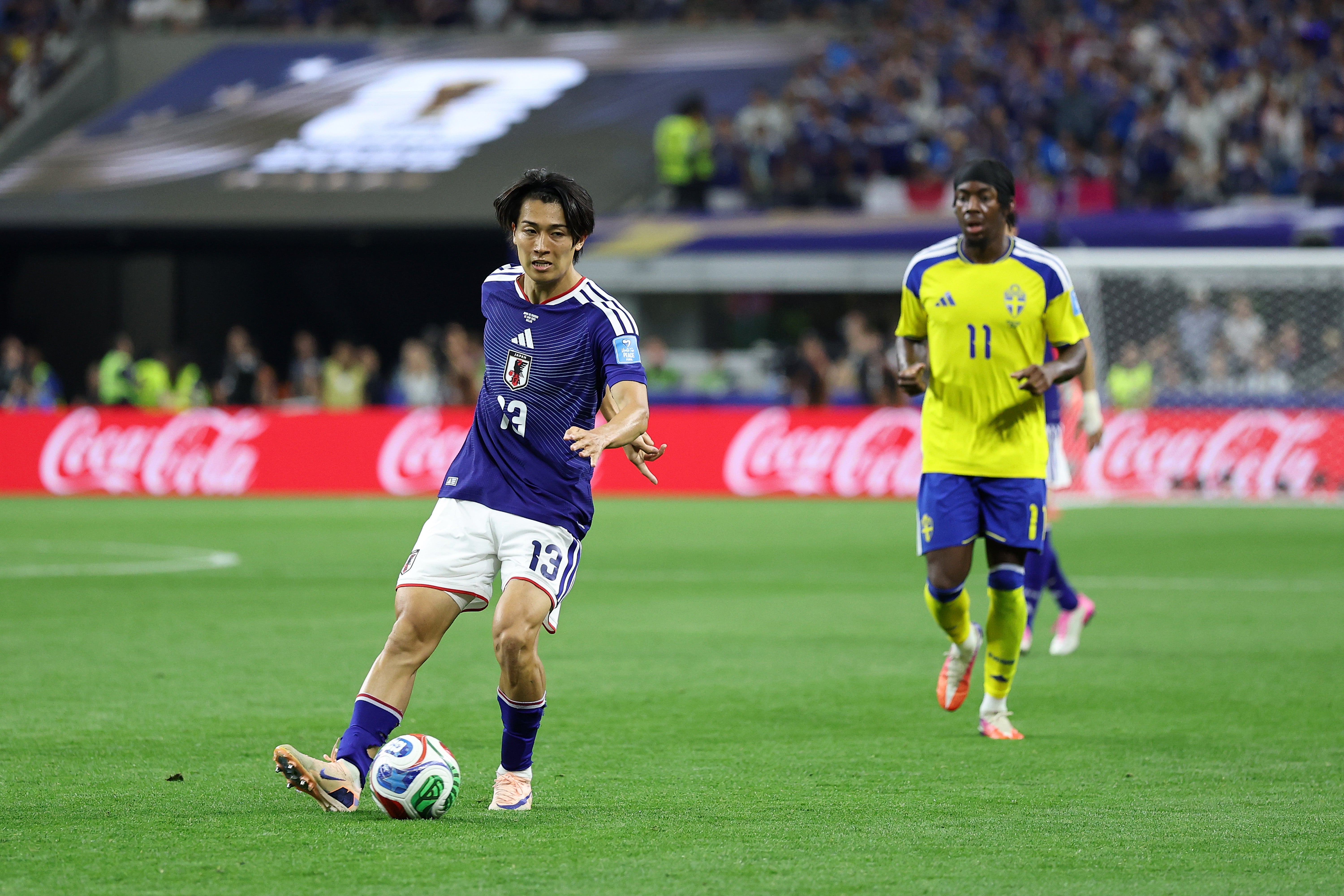 Keito Nakamura of Japan controls the ball vs Sweden