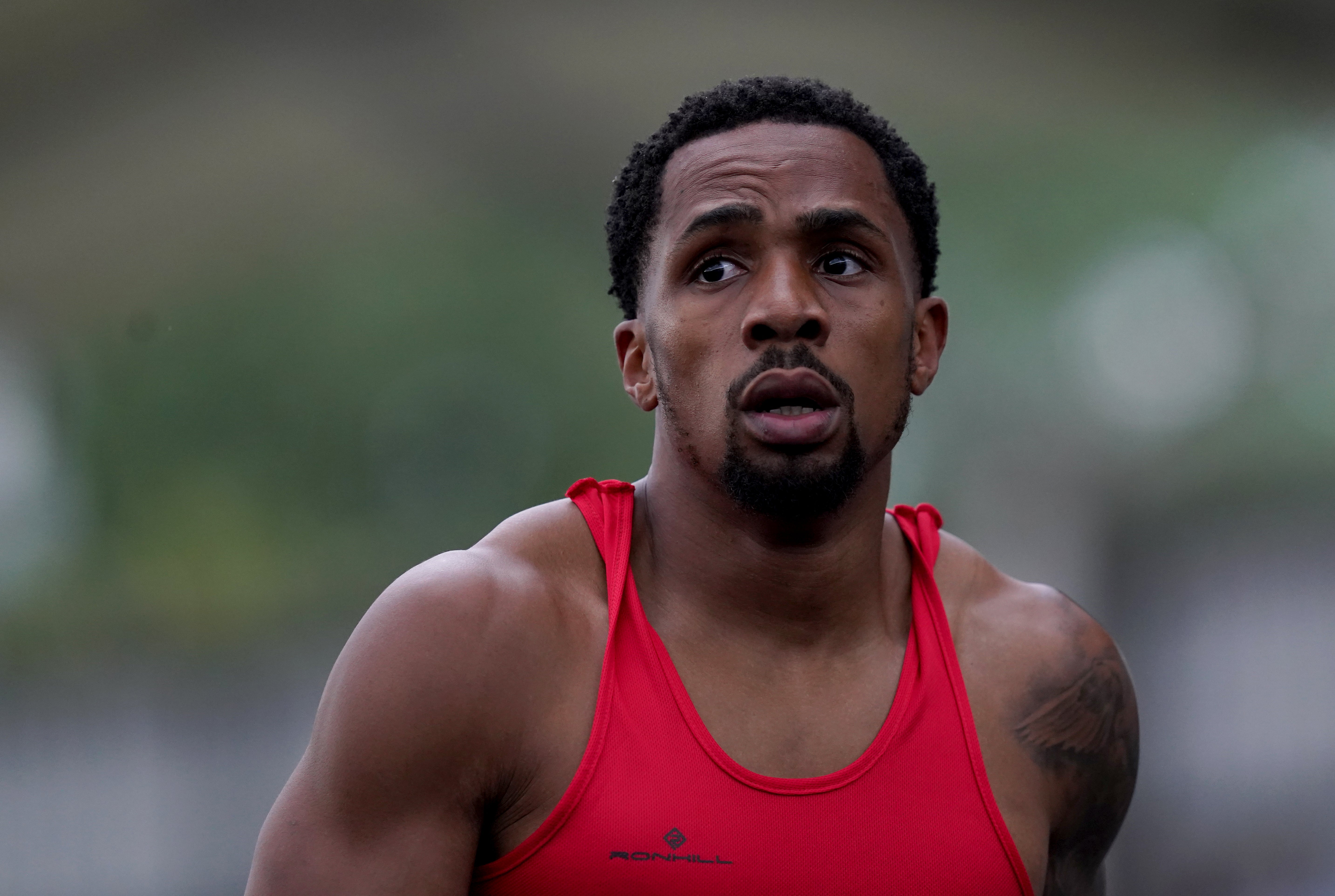 Ujah and eight other defendants pleaded not guilty to conspiracy to defraud