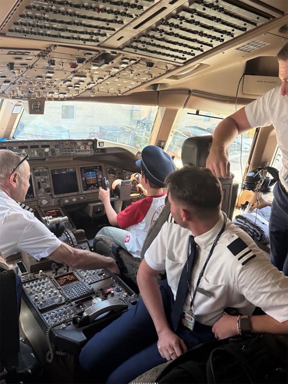 Prince Archie enjoys sitting in the pilot's seat in the cockpit