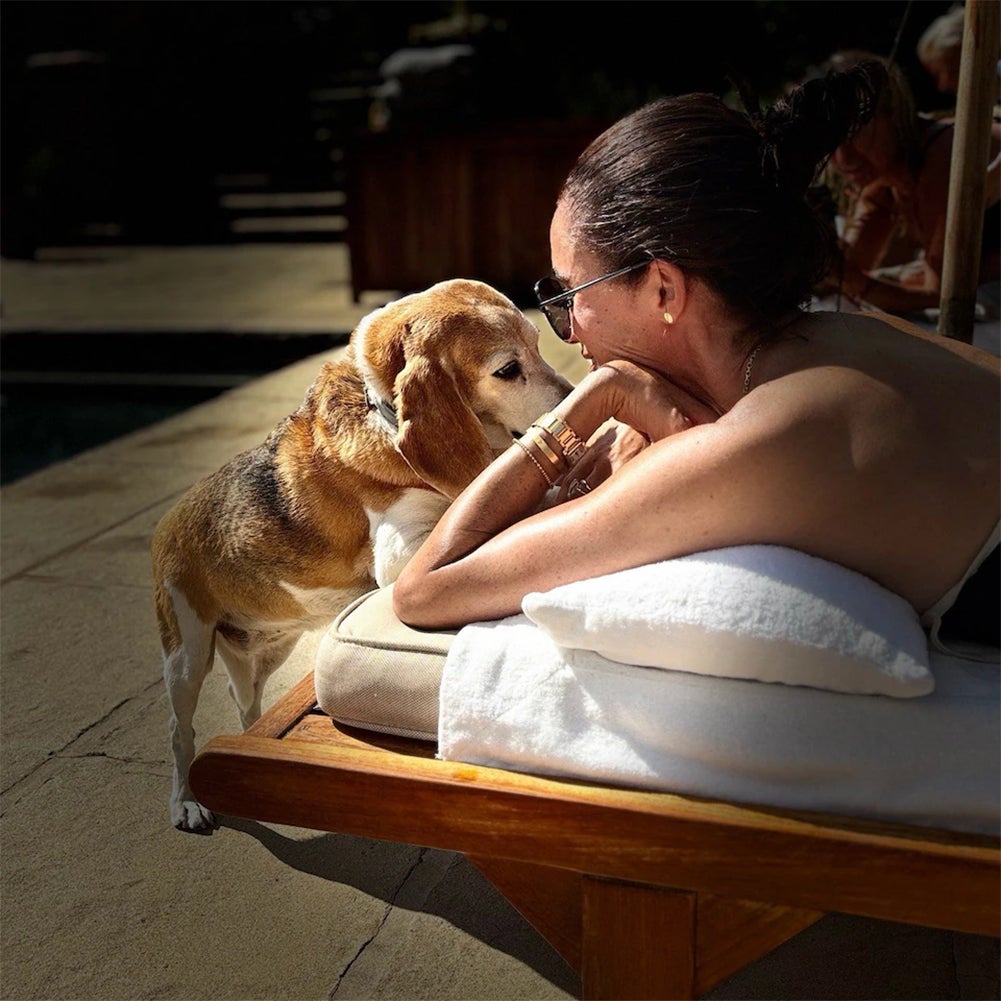 Meghan enjoys some time in the sun with her furry friend