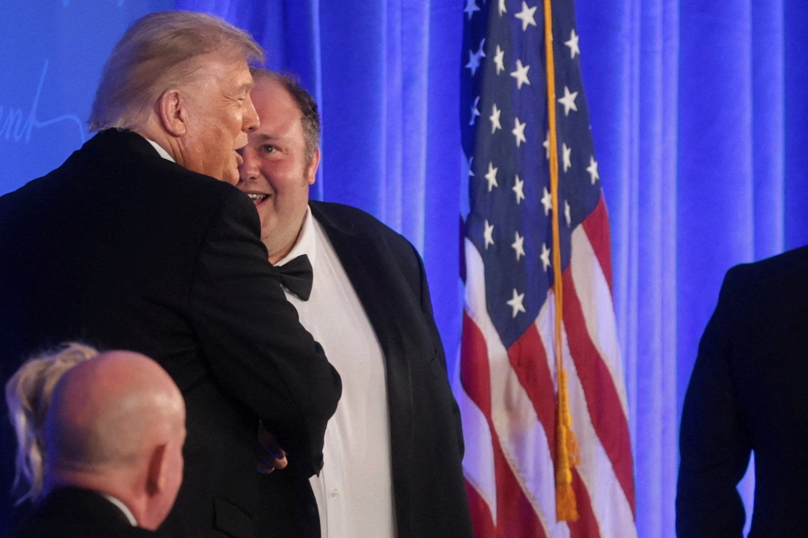 Trump shook hands with Josh Dawsey, chief political correspondent for The Wall Street Journal, who was part of the team of journalists who won an award for their coverage of Trump's friendship with Epstein (Reuters)