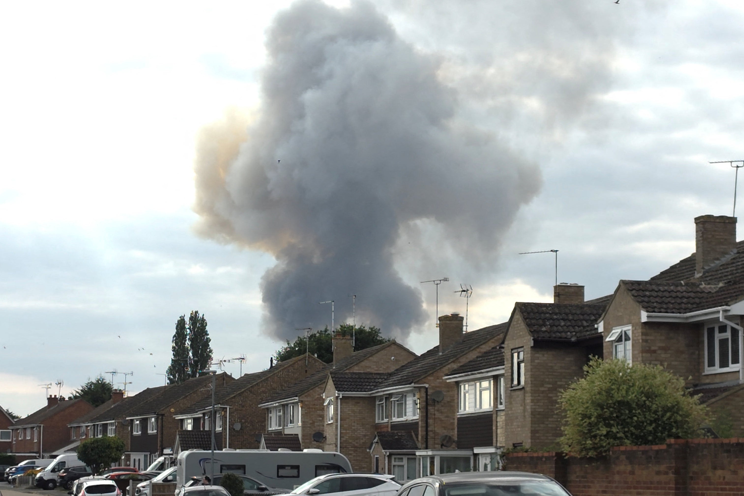 Smoke billows from a fire at an Essex industrial unit (Reuters)