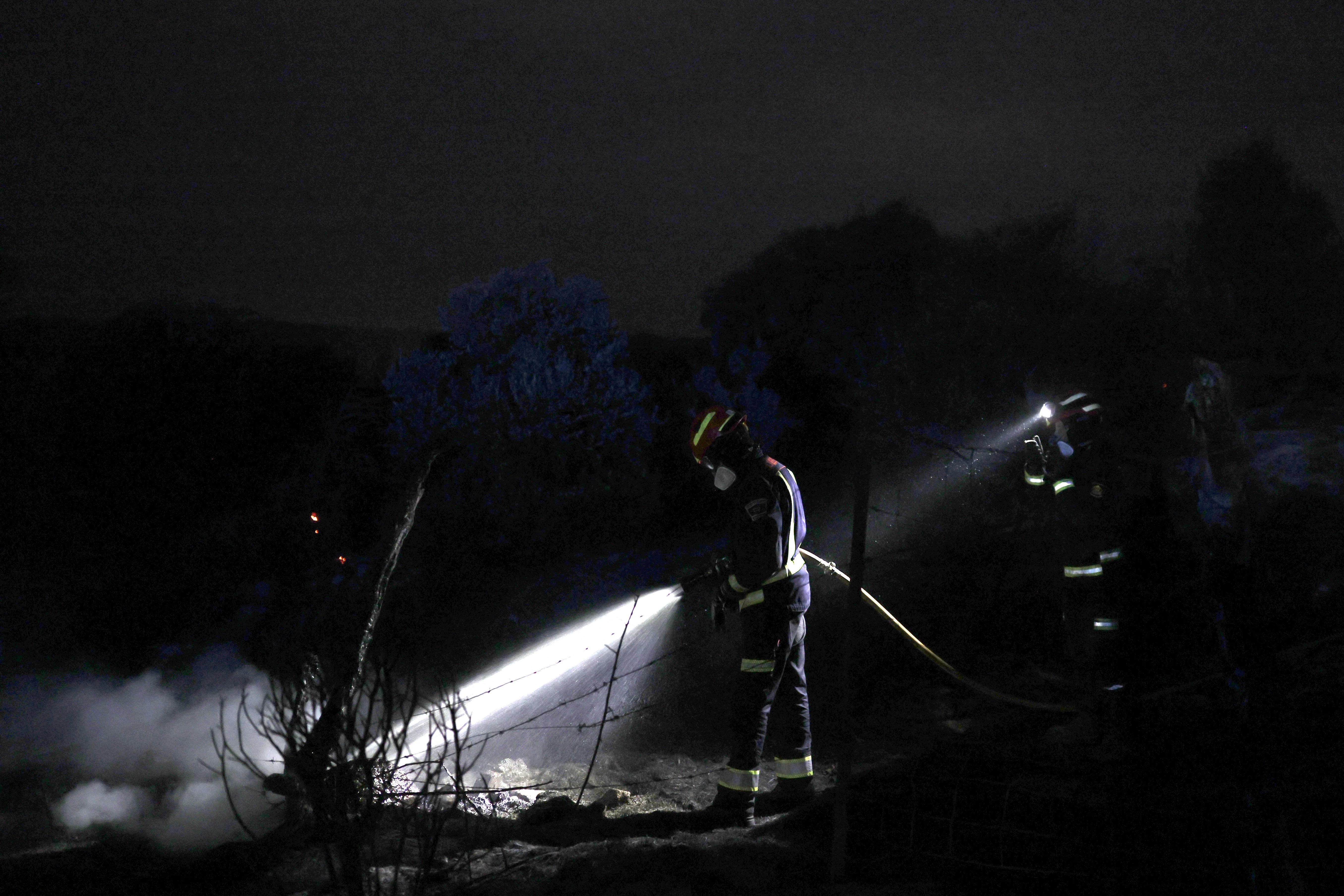 Firefighters worked through the night in Fresnedillas, Spain (AFP/Getty)