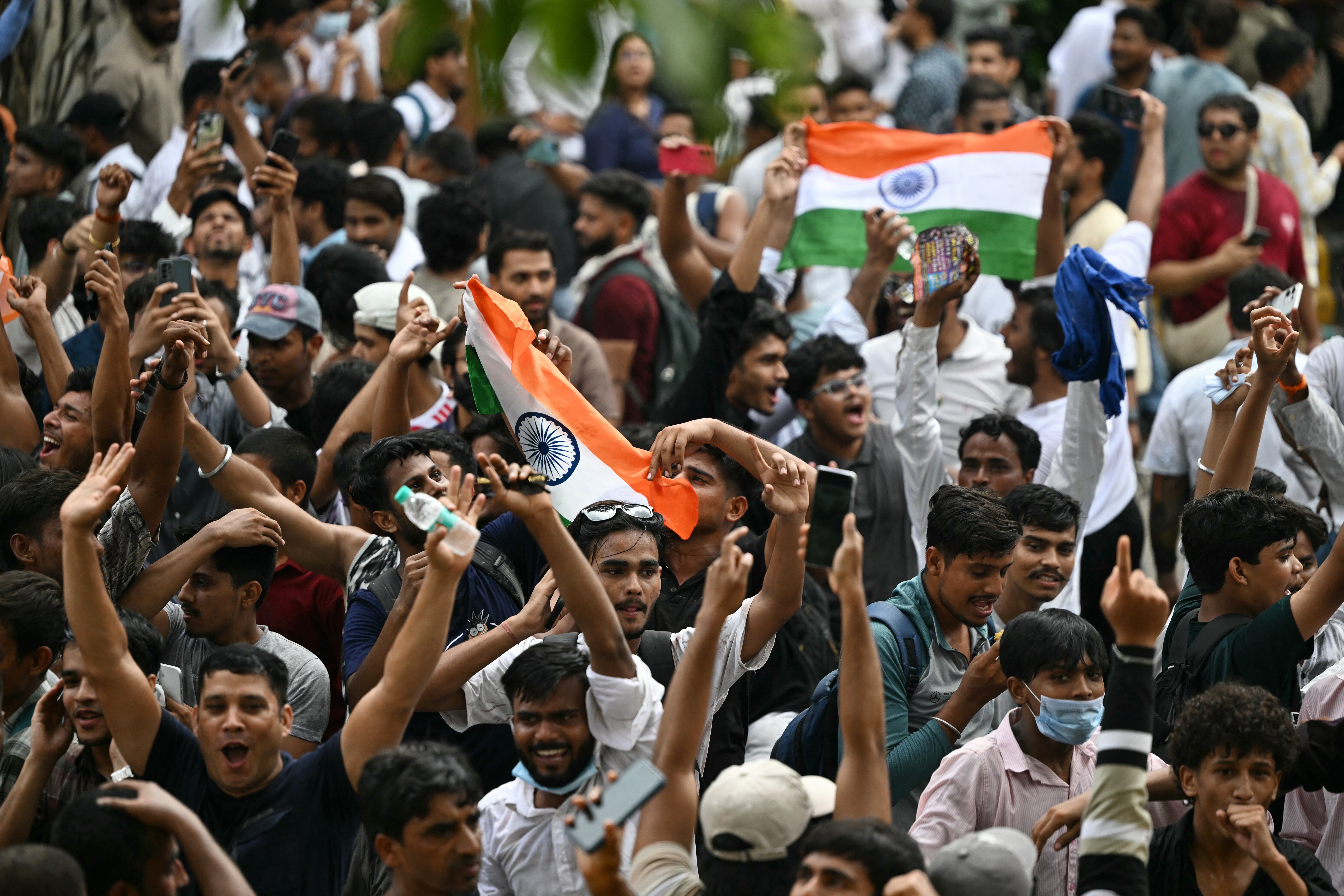 Cockroach Janta Party (CJP) supporters celebrate the resignation of India’s Education Minister Dharmendra Pradhan, at Jantar Mantar in New Delhi on 25 July 2026