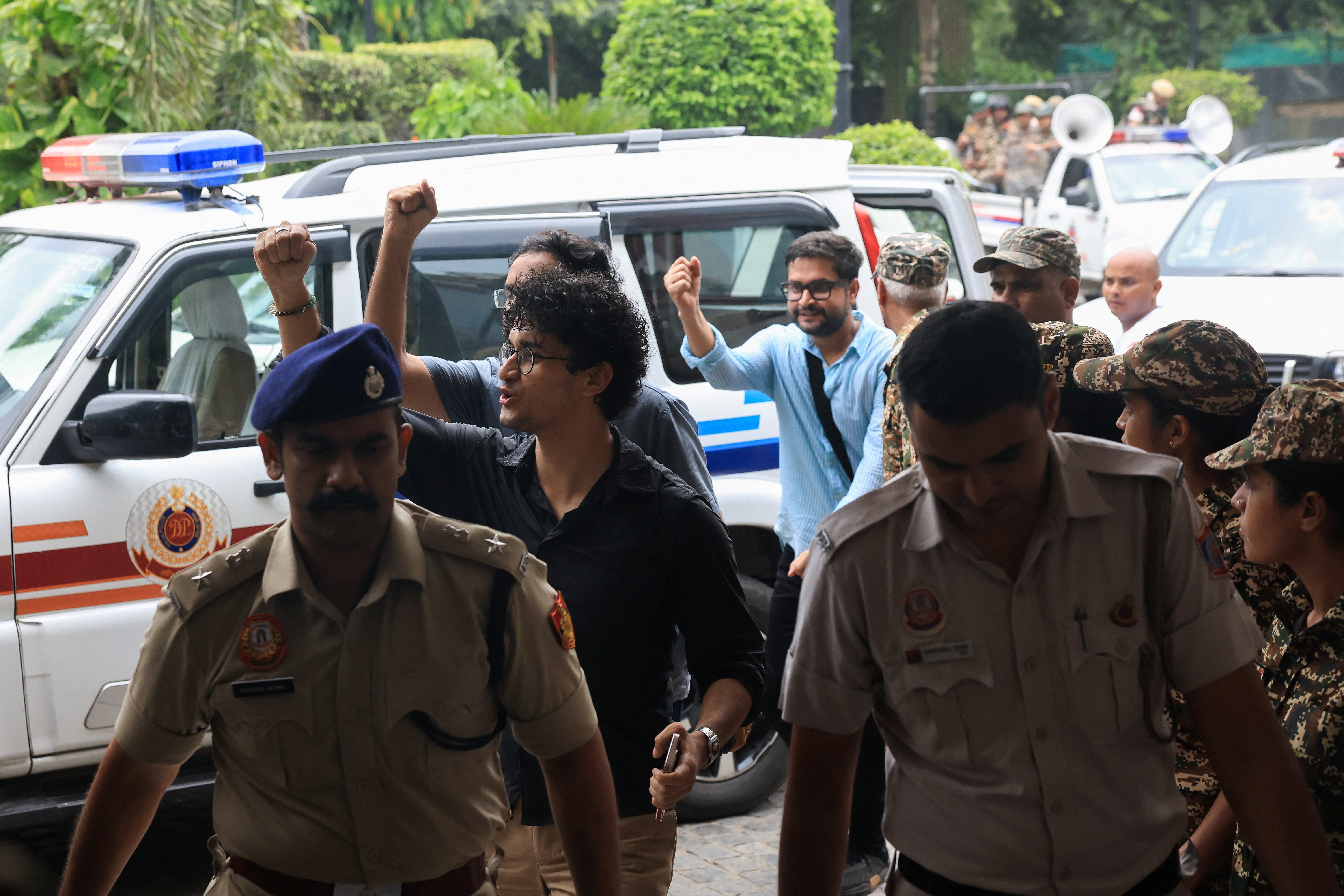 Saurav Das and Ashutosh Ranka, spokespersons from Cockroach Janta Party (CJP) arrive at constitution club to hold talks with JP Nadda, India’s senior federal ministers, after India’s Education Minister Dharmendra Pradhan resigned