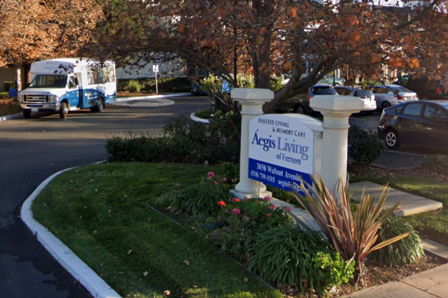 An armed man who held two people hostage was shot and killed by police Friday inside Aegis Living Fremont in an incident the facility’s owners said stemmed from a family dispute